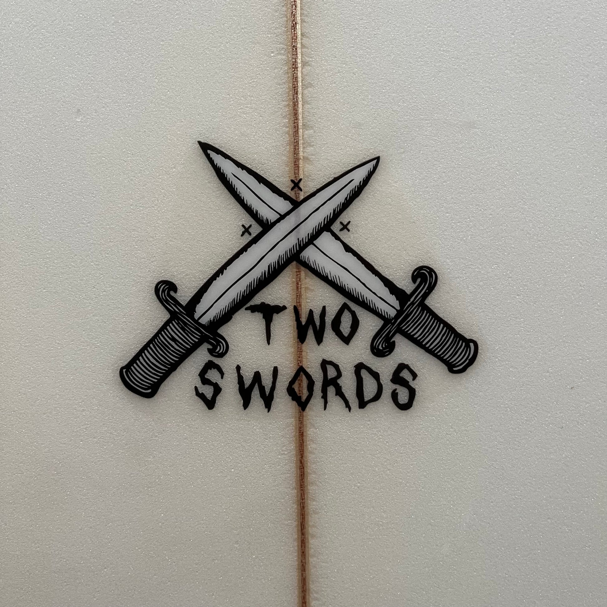 4D Surfboards Two Swords 6'4" secondhand surfboard model logo close-up