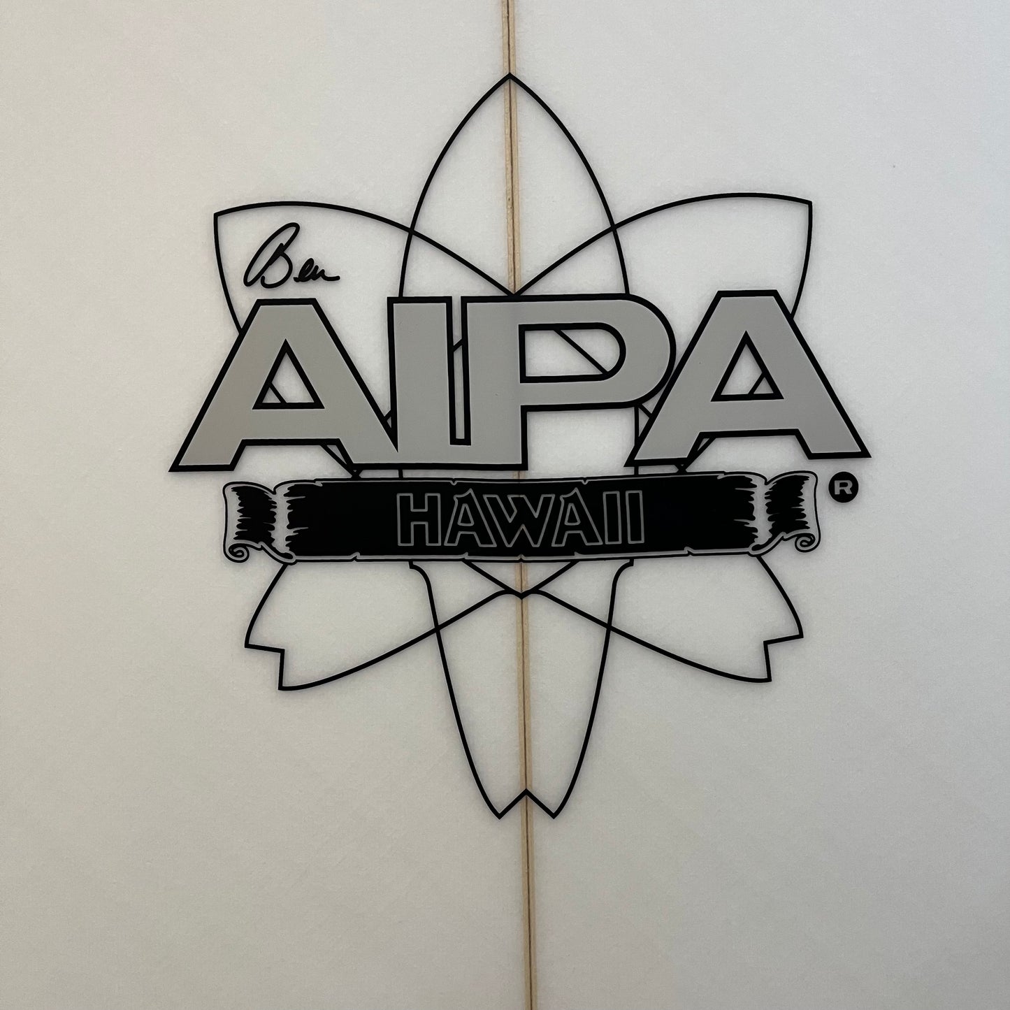 AIPA Big Boy Sting 7'0" secondhand surfboard brand logo close-up