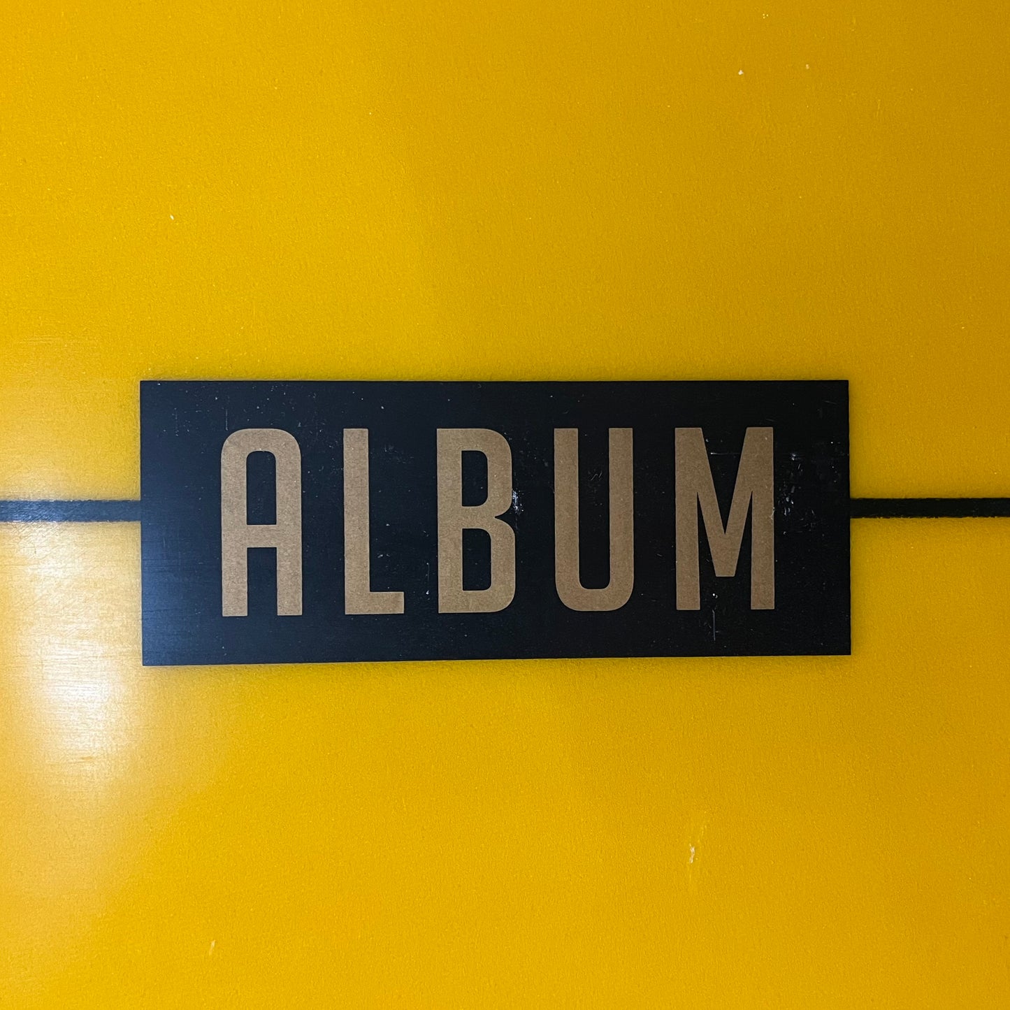 Album Darkness 6'9" secondhand surfboard brand logo close-up