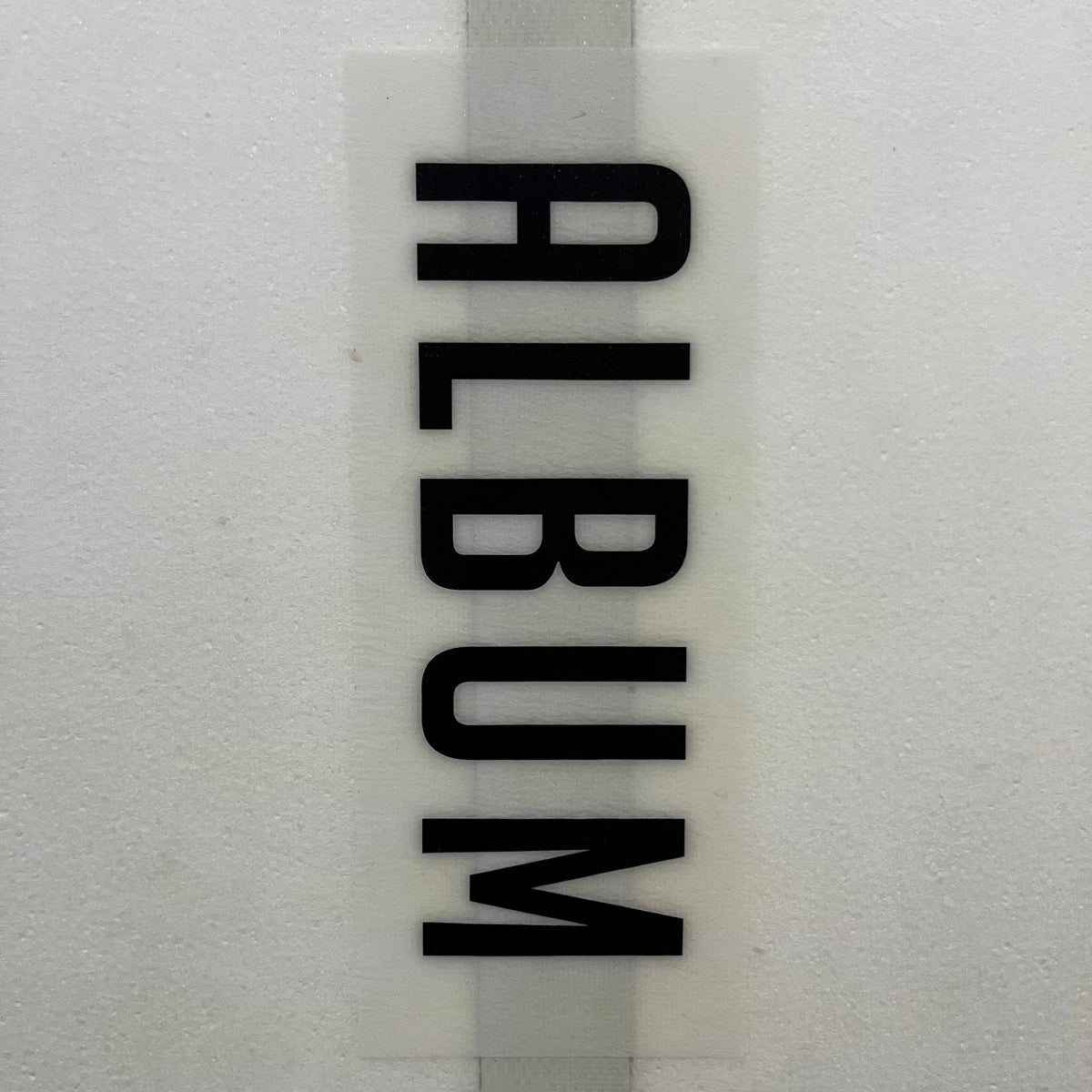 Album Lightbender 5'6" secondhand surfboard brand logo close-up