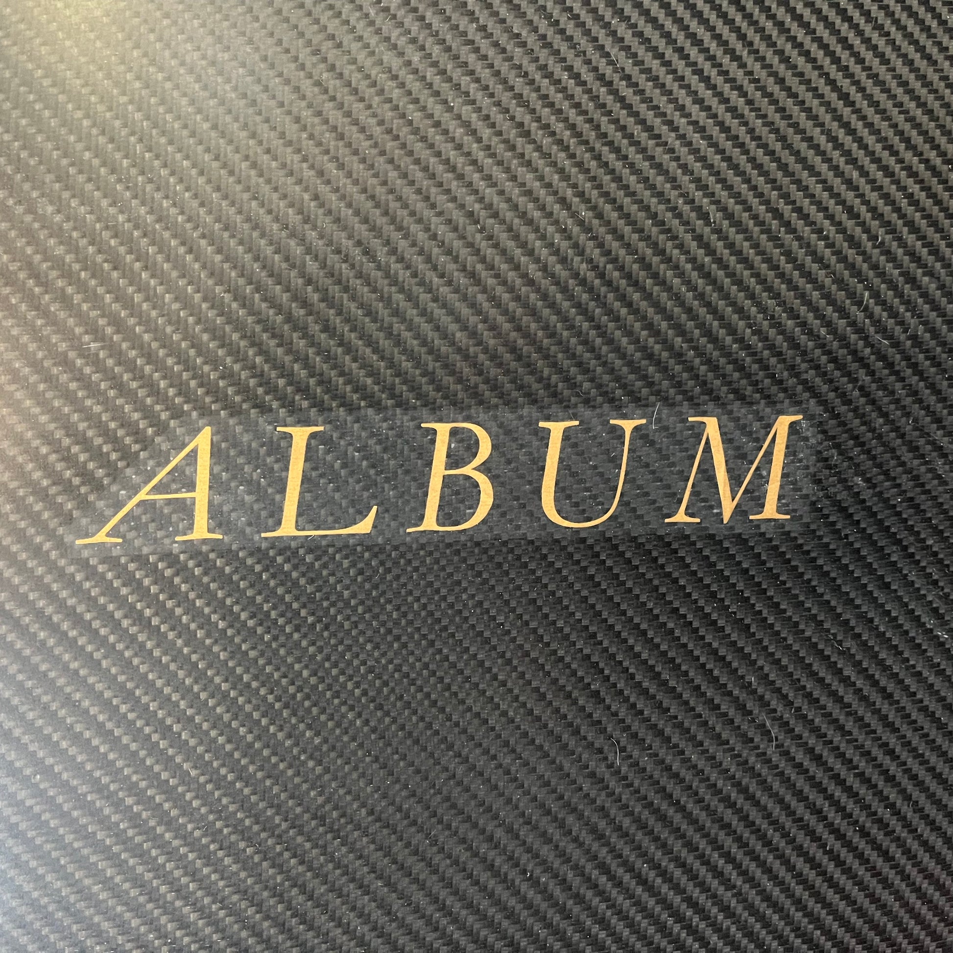 Album Lucent 6'2" secondhand surfboard brand logo close-up