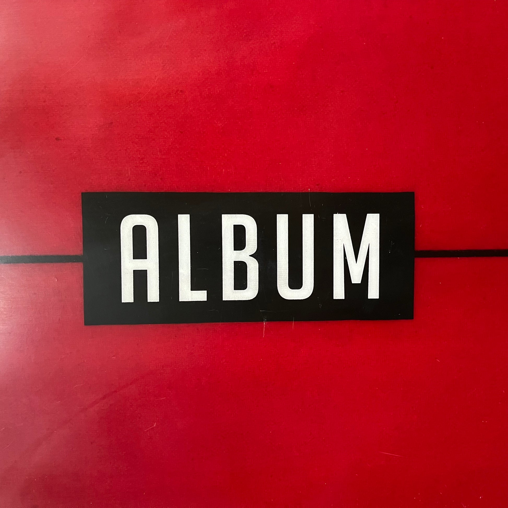 Album Moonstone 6'0" secondhand surfboard brand logo close-up