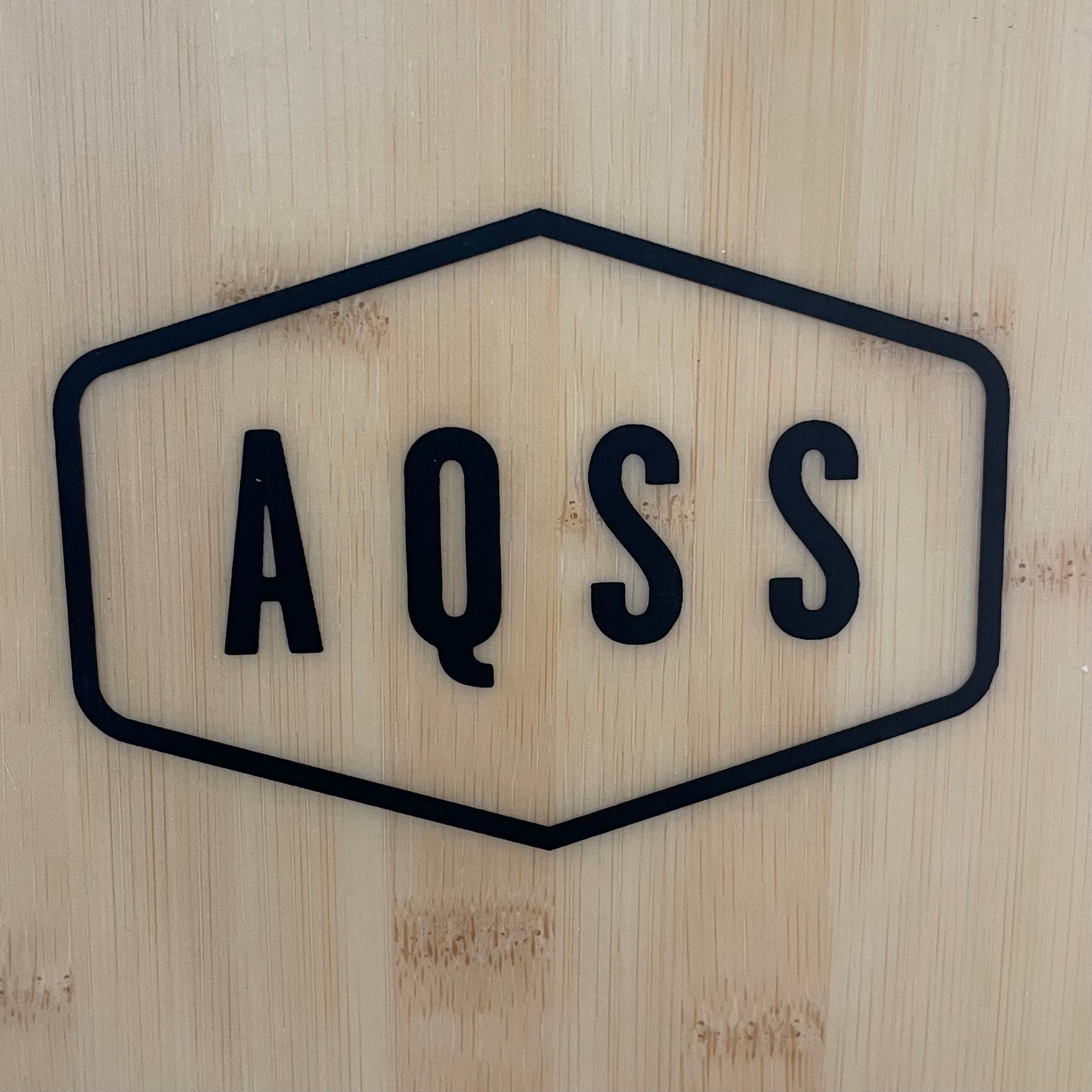 Aqss Flying Fish 5'10" secondhand surfboard brand logo close-up
