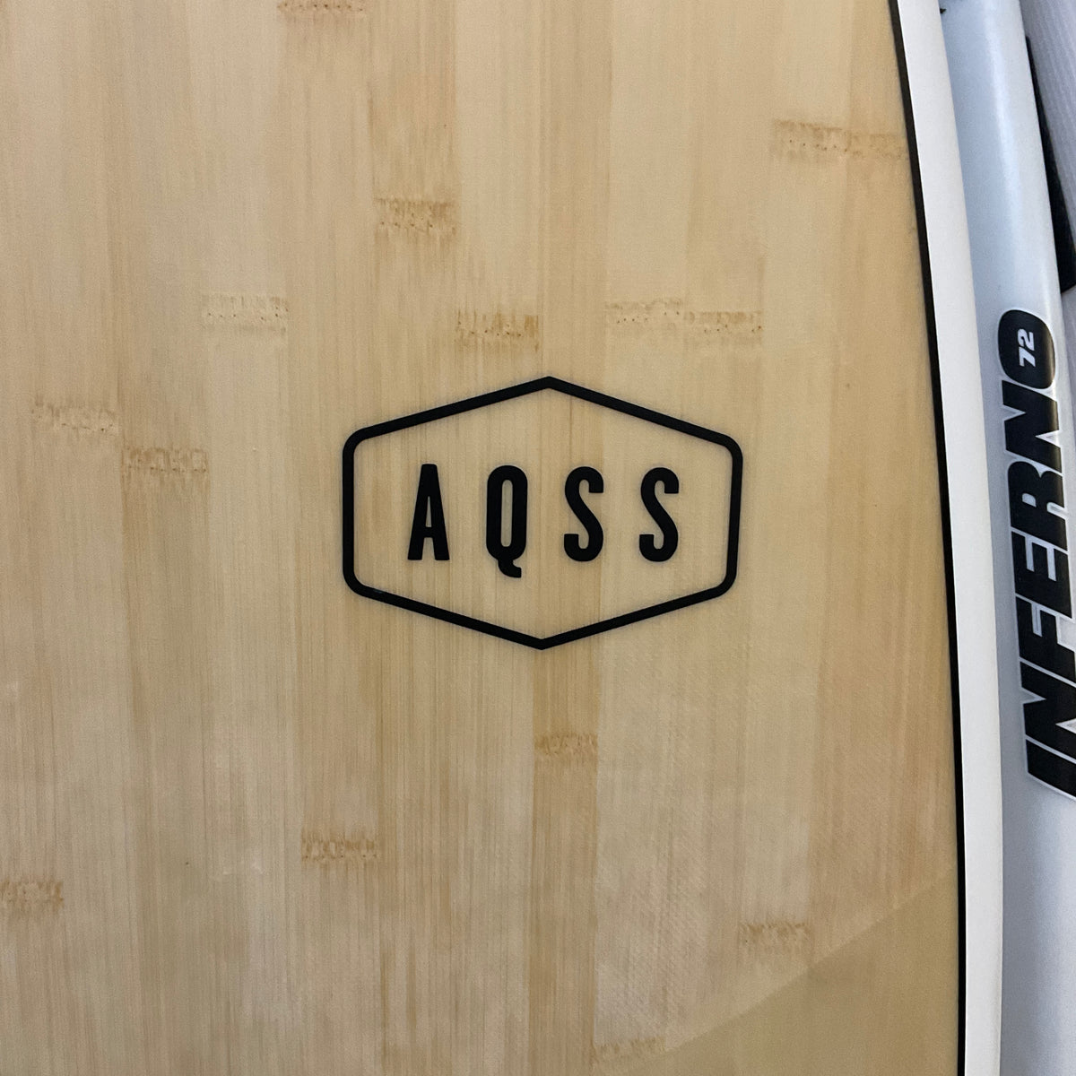 AQSS Flying Fish 6'0" secondhand surfboard brand logo close-up