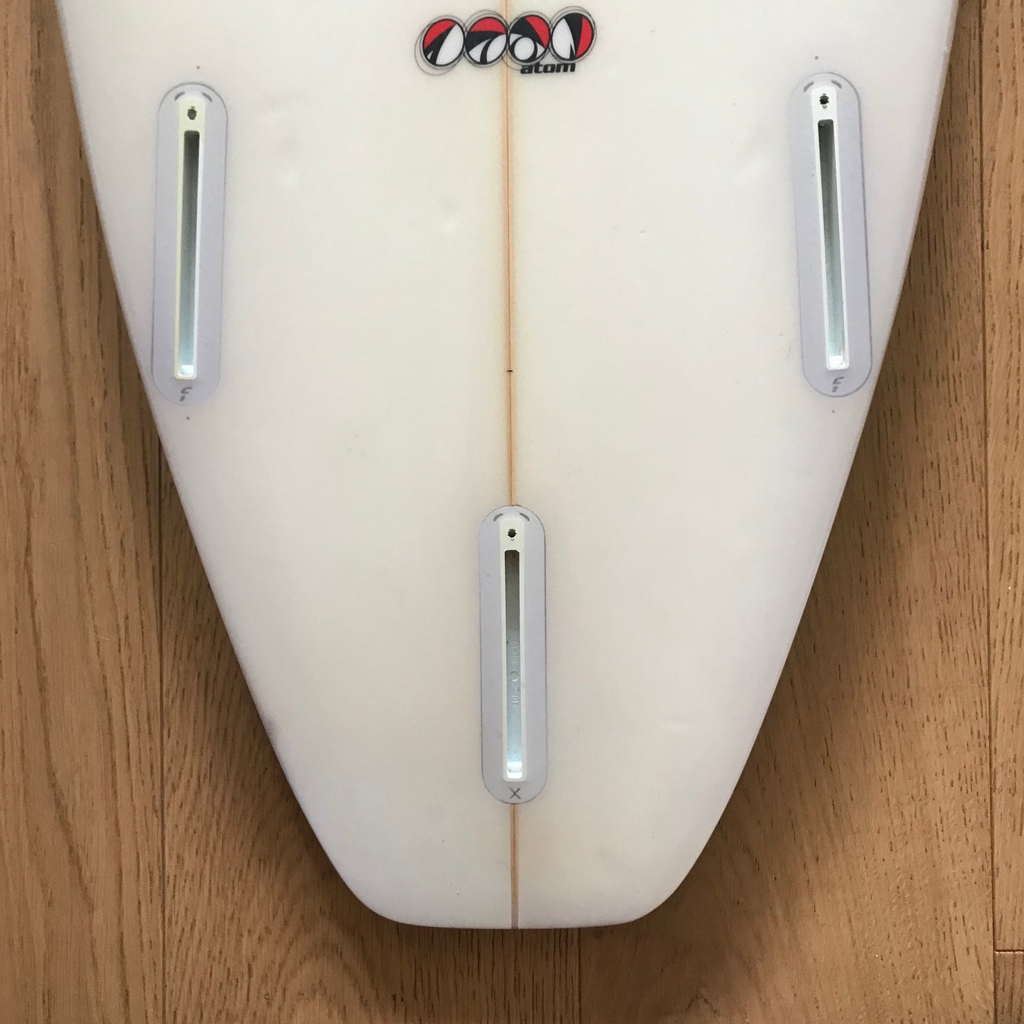Atom high performance shortboard 6'2" secondhand surfboard fin box close-up