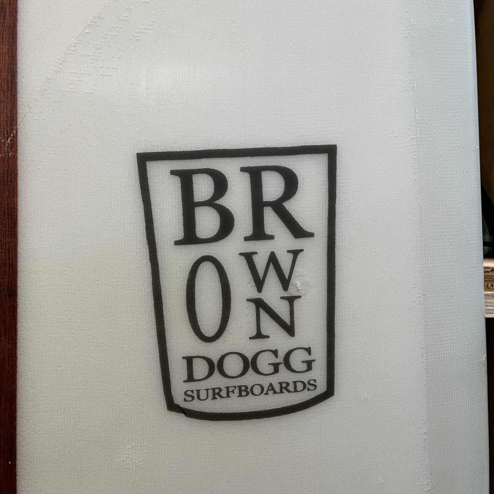 Brown Dogg Surfboards midlength pig pin tail 7'6" secondhand surfboard brand logo close-up