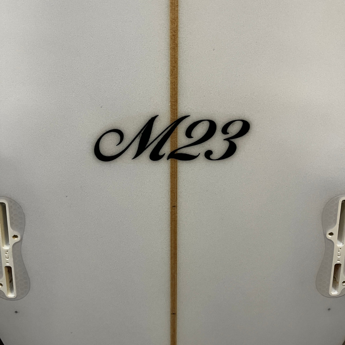Channel Islands M23 7'2" secondhand surfboard model logo close-up