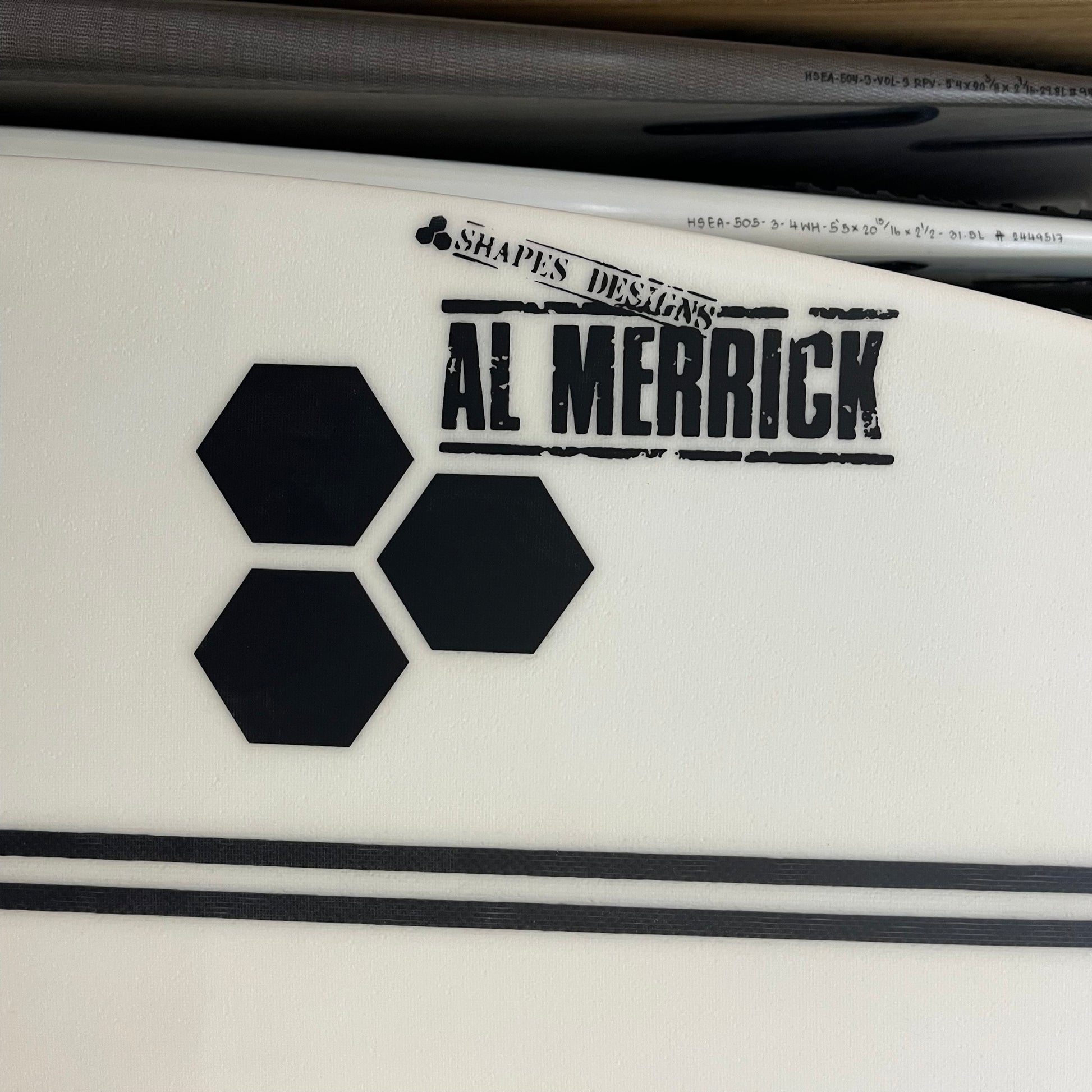 Channel Islands Rocket Wide 5'10" secondhand surfboard brand logo close-up