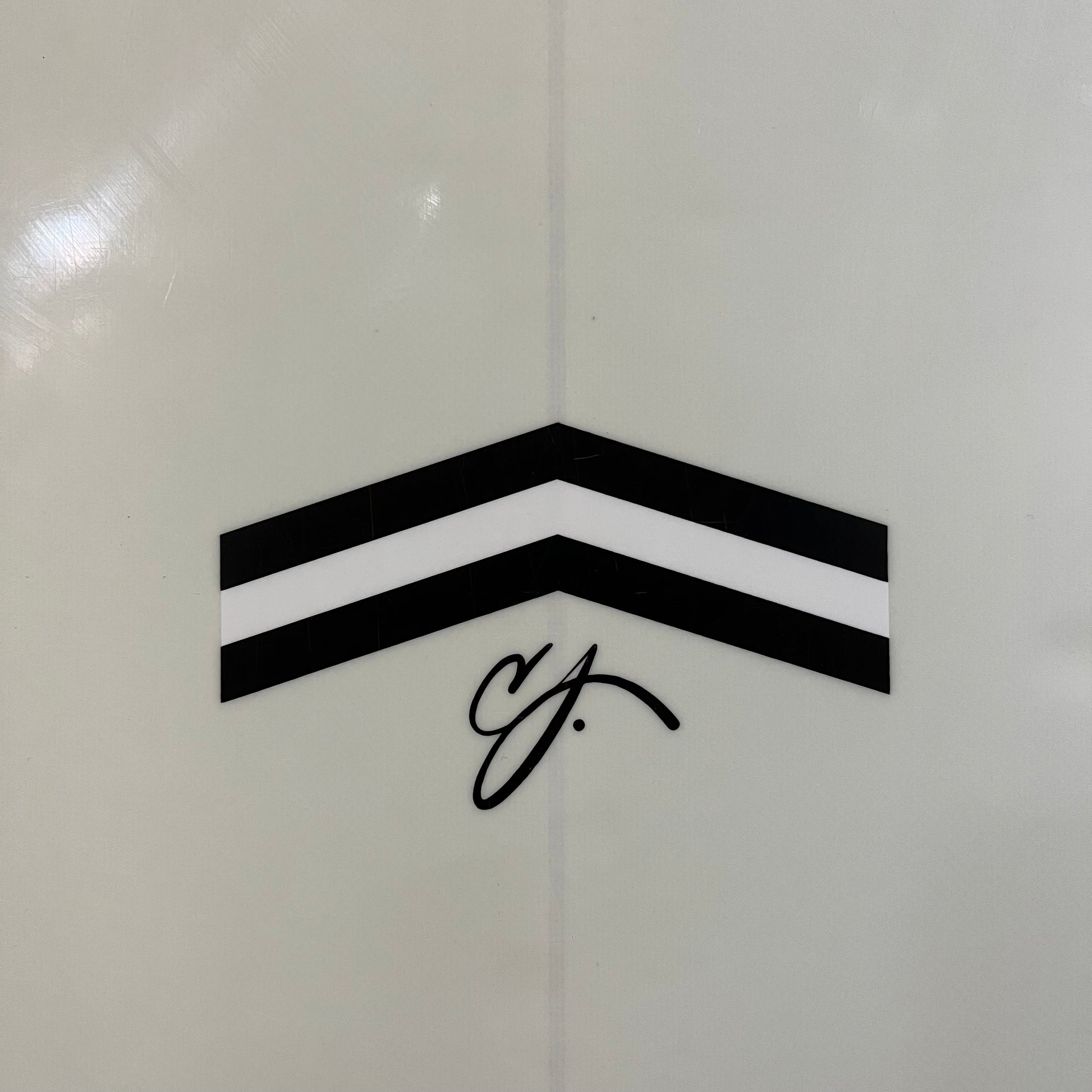 CJ Nelson Outlier 7'6" secondhand surfboard brand logo close-up