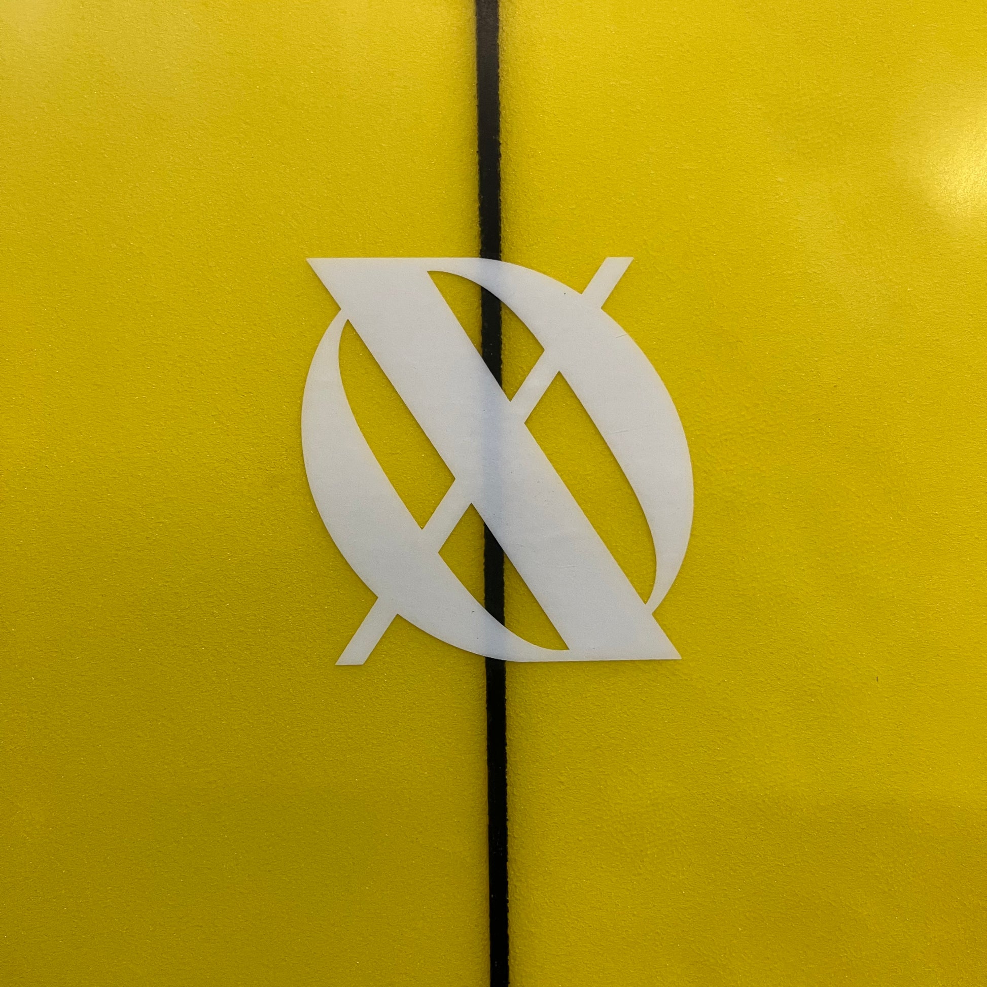 XO Coco Halcyon 6'9" secondhand surfboard brand logo close-up