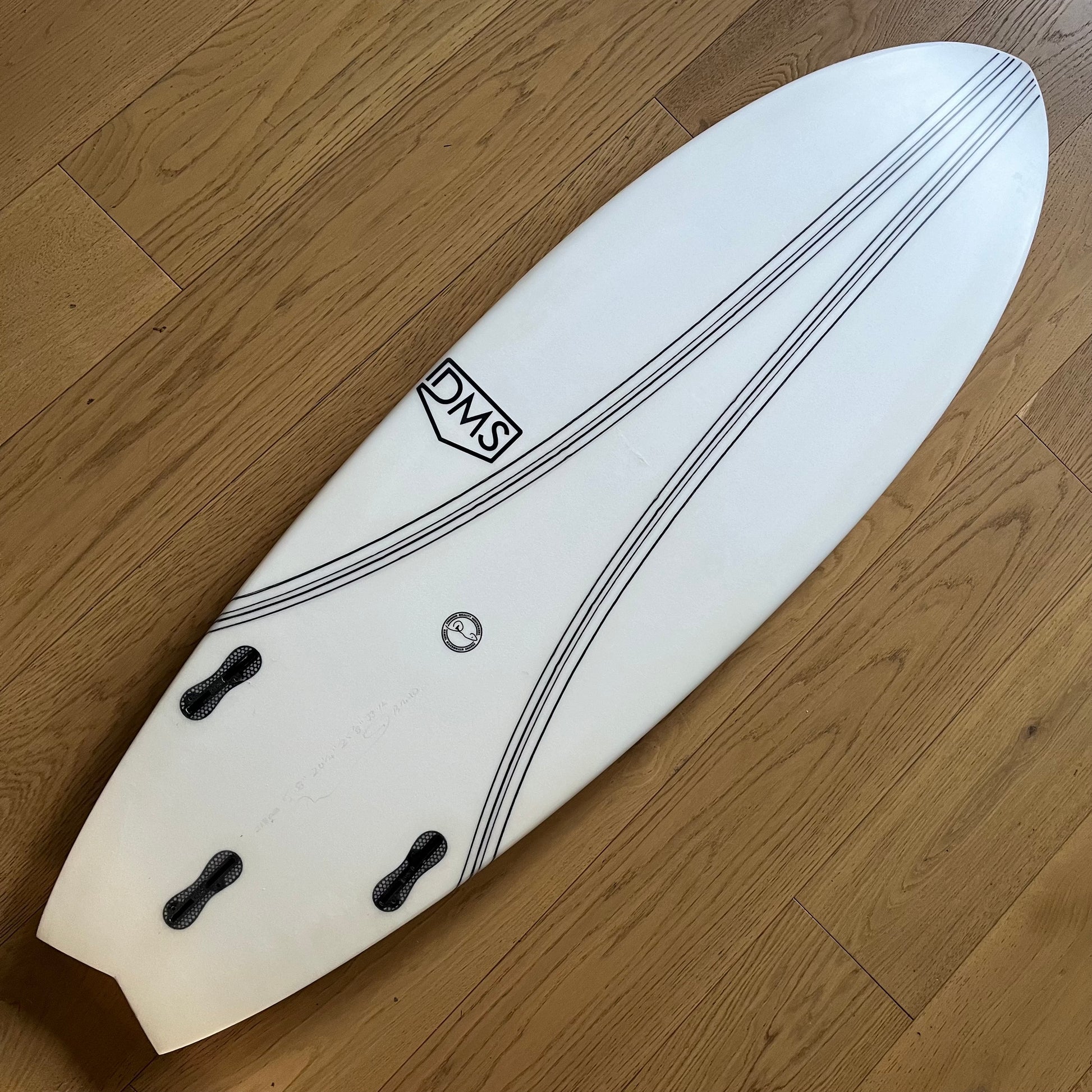 DMS Fish 5'8" secondhand surfboard bottom view