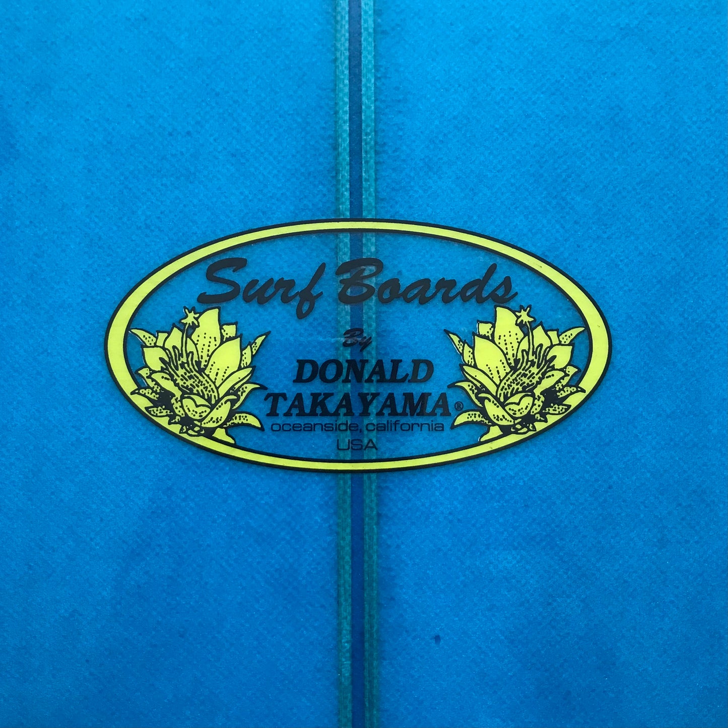 Donald Takayama Howard Special Mini 7'0" secondhand surfboard brand logo close-up