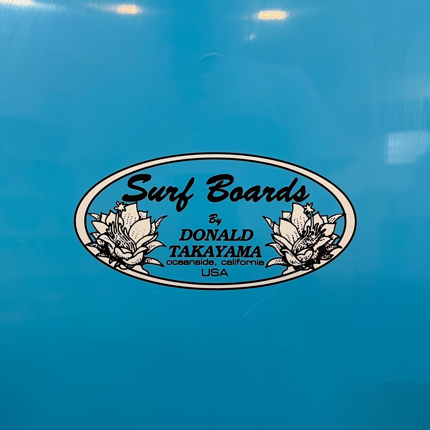 Donald Takayama Scorpion 2 5'10" secondhand surfboard brand logo close-up