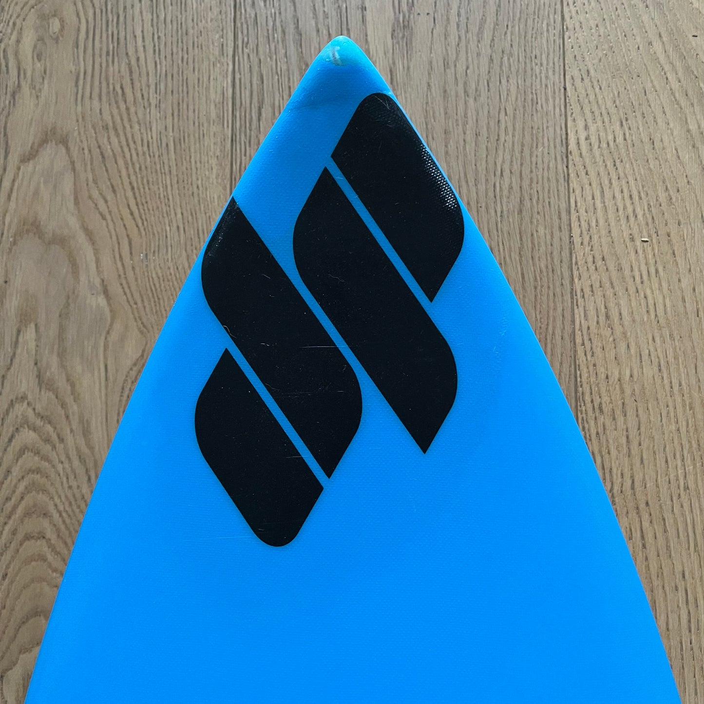 Dylan Perese high performance shortboard 5'11" secondhand surfboard brand logo close-up