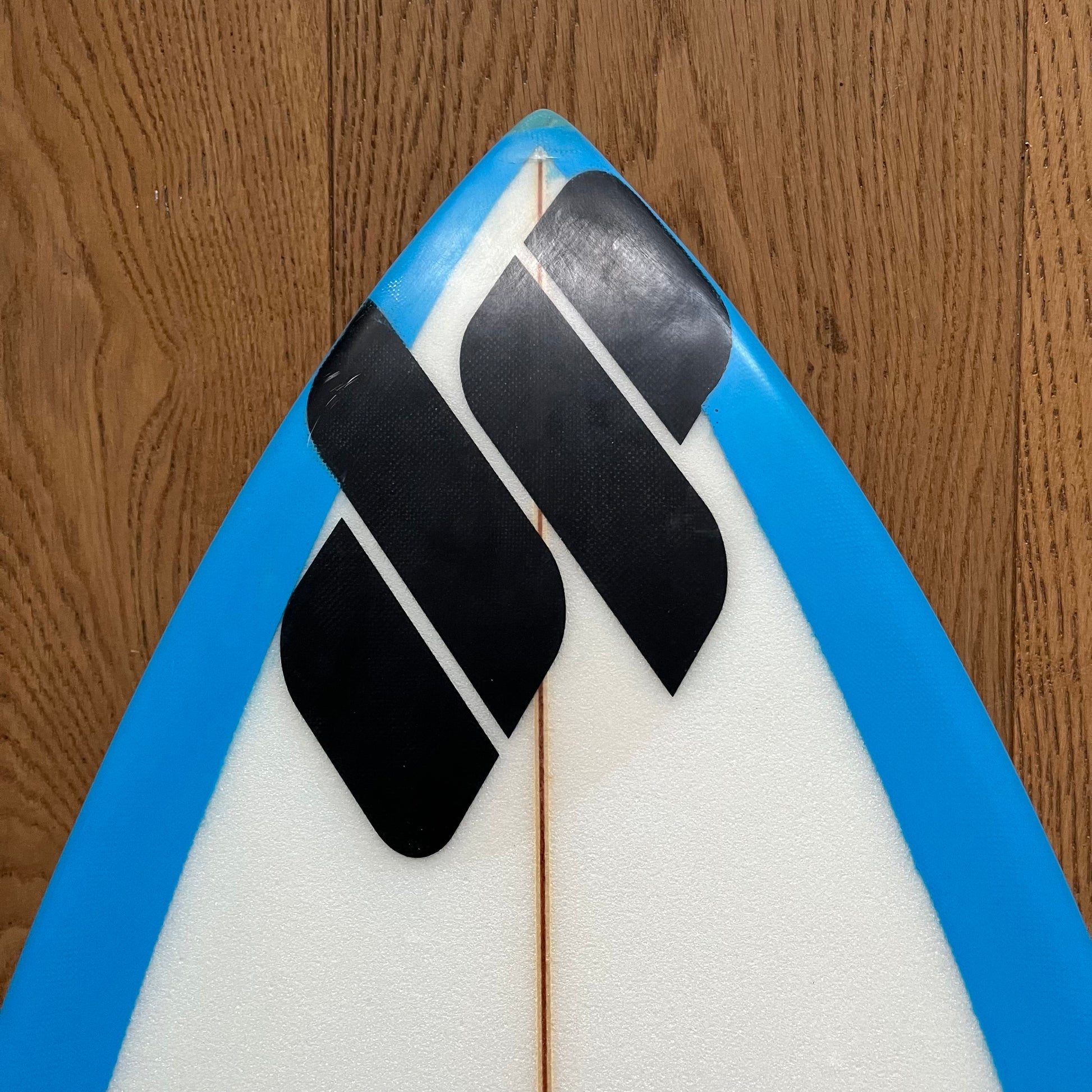 Dylan Perese high performance shortboard 5'11" secondhand surfboard brand logo close-up