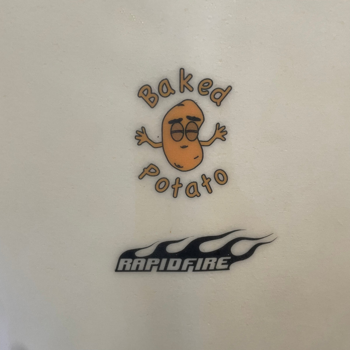 Firewire baked potato 5'7" secondhand surfboard model logo close-up