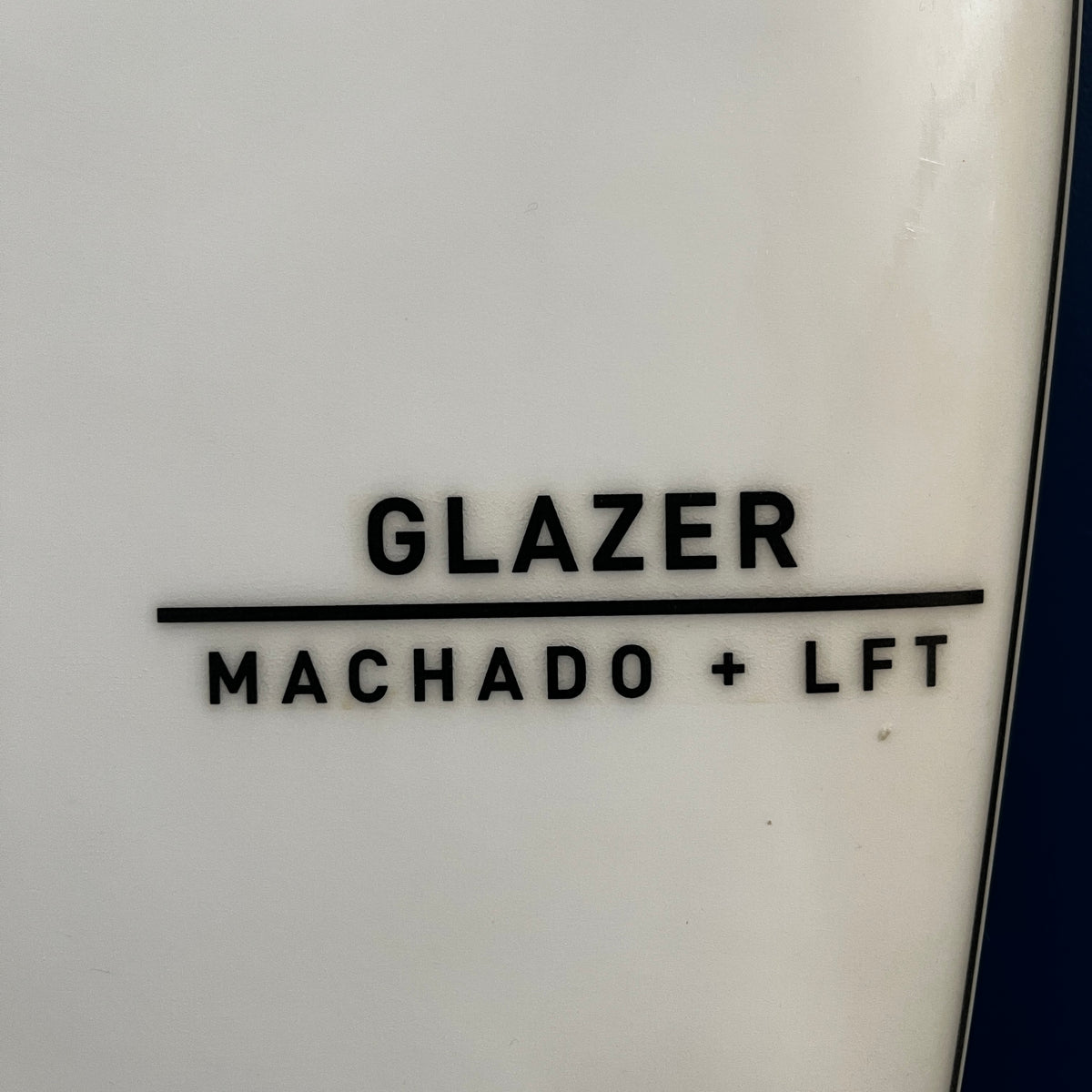 Firewire Glazer 5'7" secondhand surfboard model logo close-up