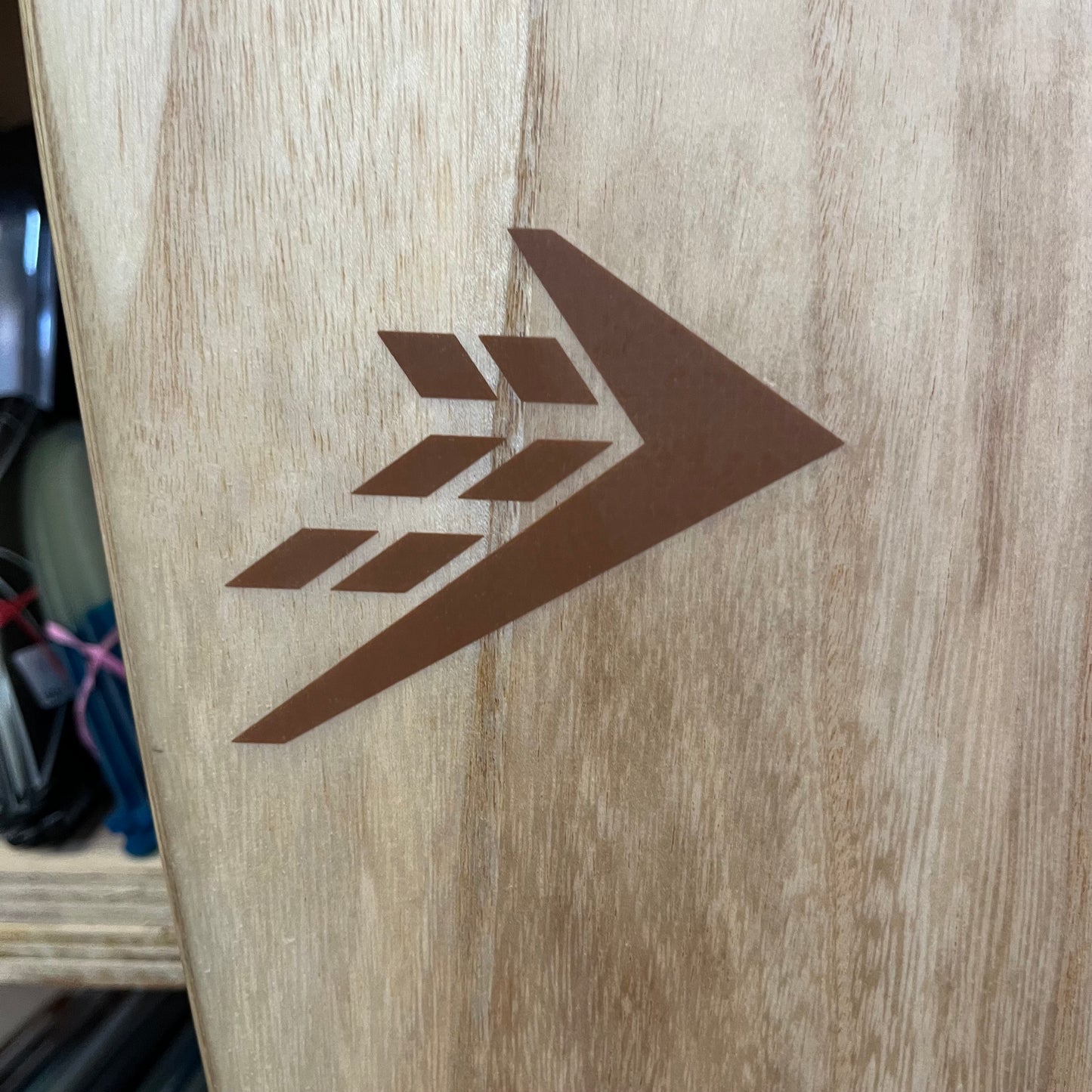 Firewire Greedy Beaver 5'10" secondhand surfboard brand logo close-up