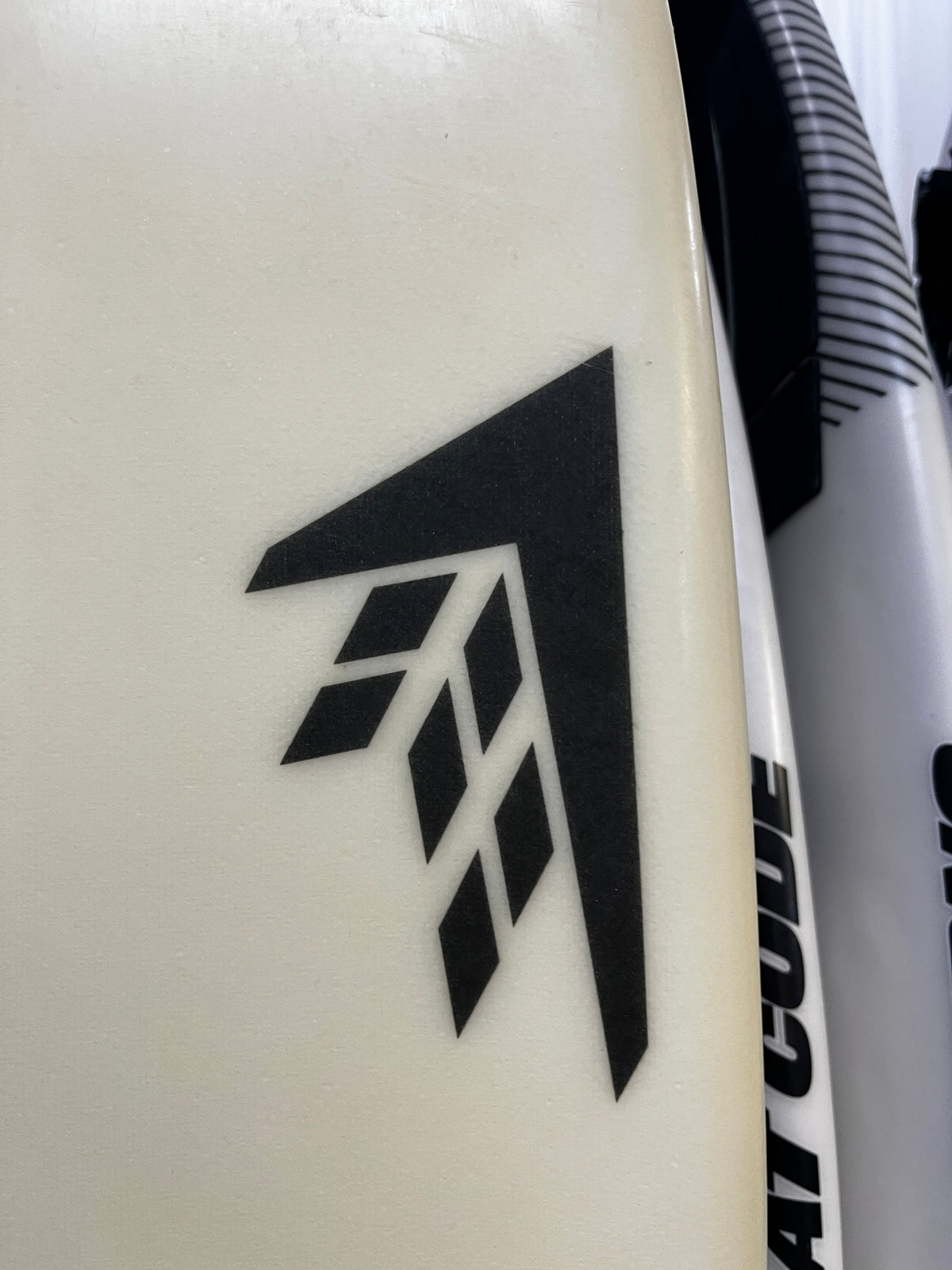 Firewire Greedy Beaver 6'6" secondhand surfboards brand logo close-up
