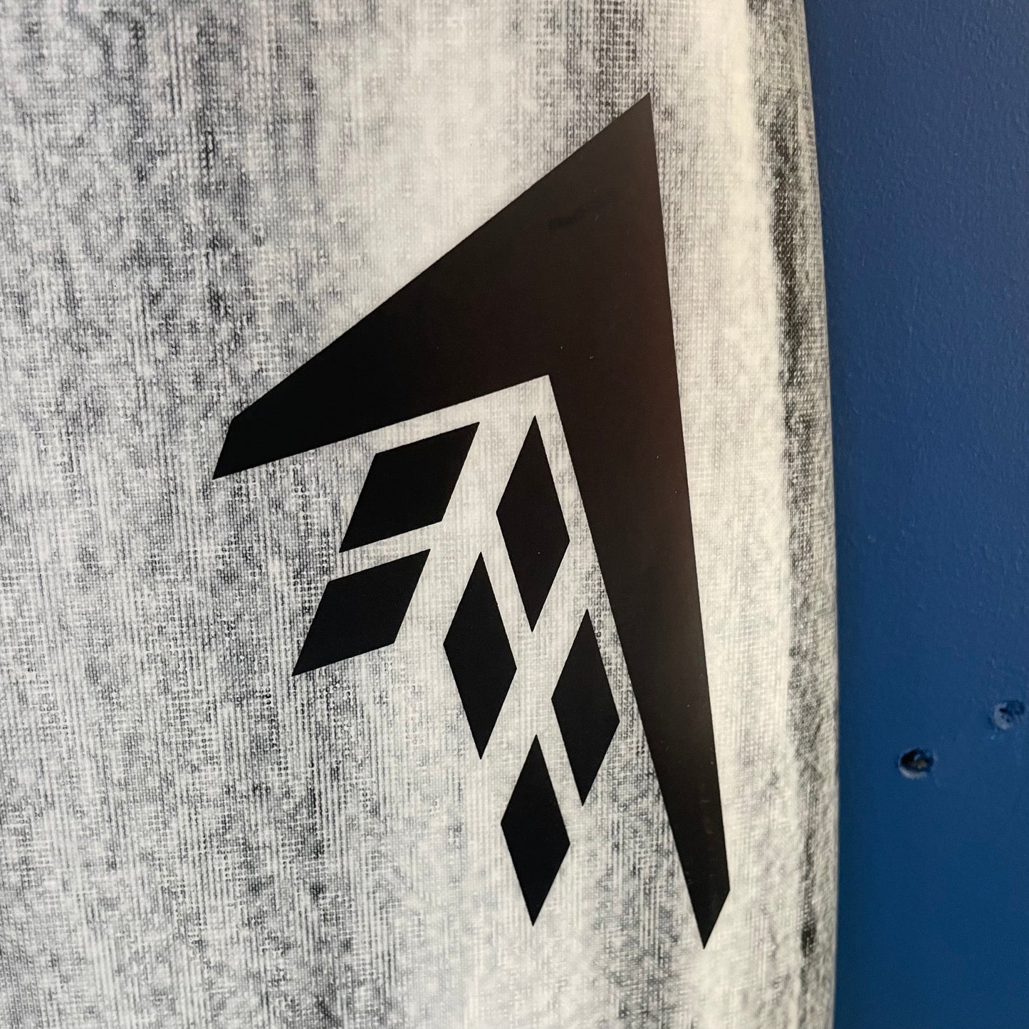 Firewire Seaside 5'6" secondhand surfboard brand logo close-up