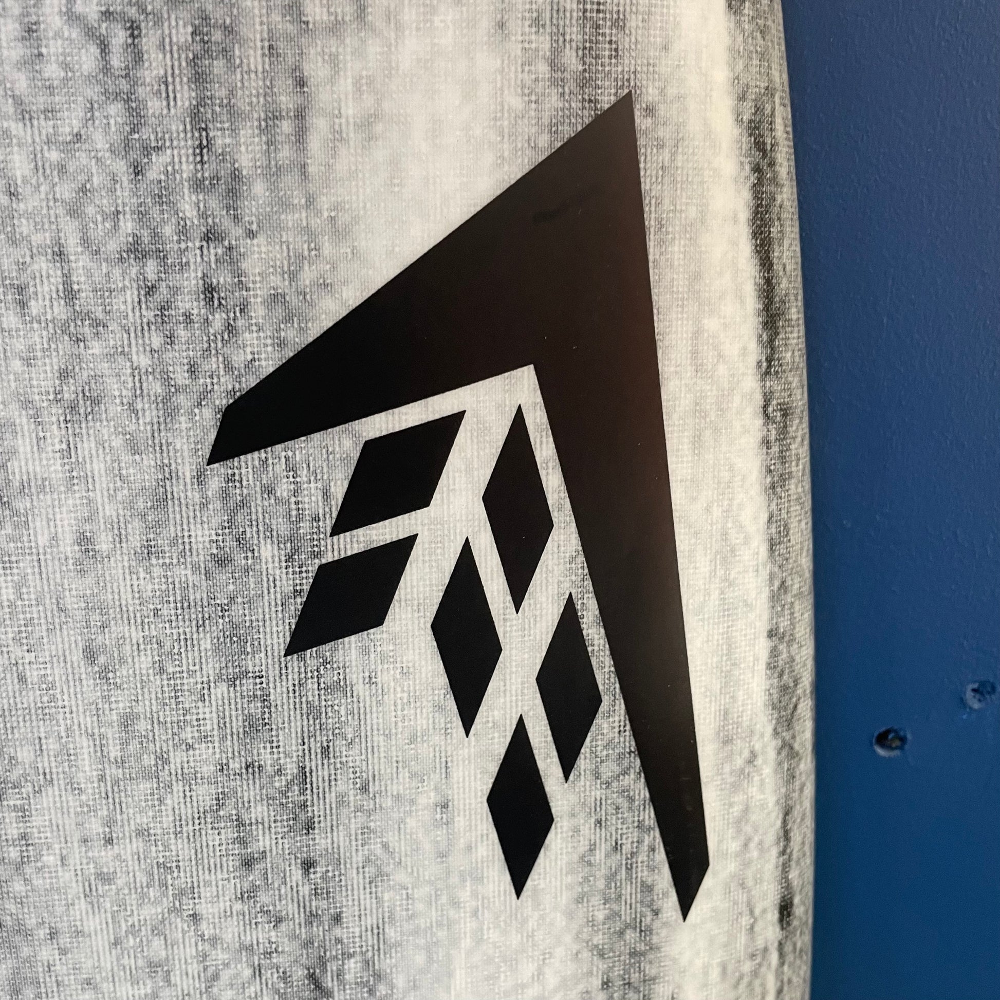 Firewire Seaside 5'6" secondhand surfboard brand logo close-up