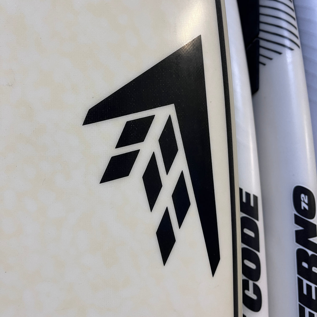 Firewire Seaside and Beyond 6'8" secondhand surfboard brand logo close-up