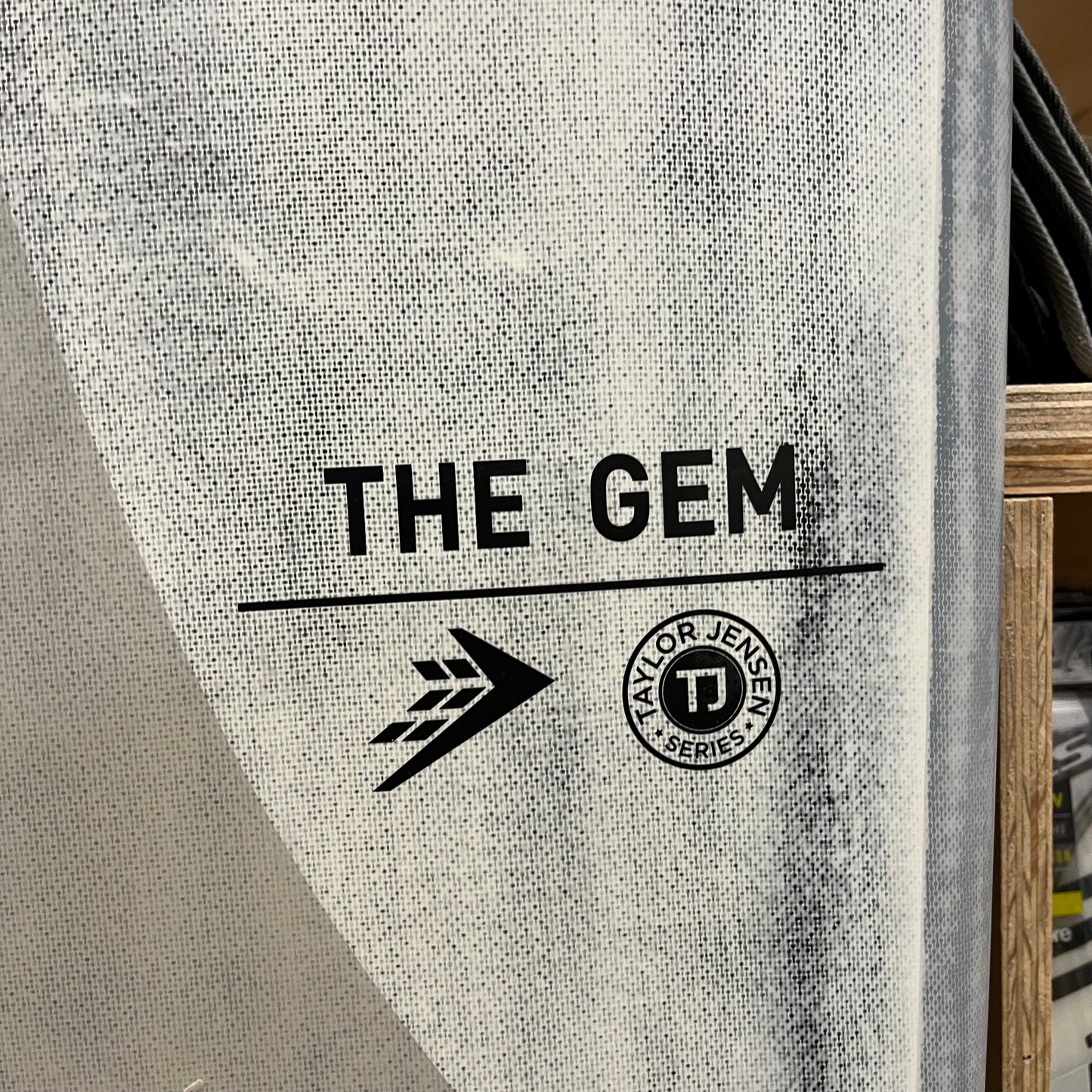 Firewire TJ The Gem 9'1" secondhand surfboard brand logo close-up