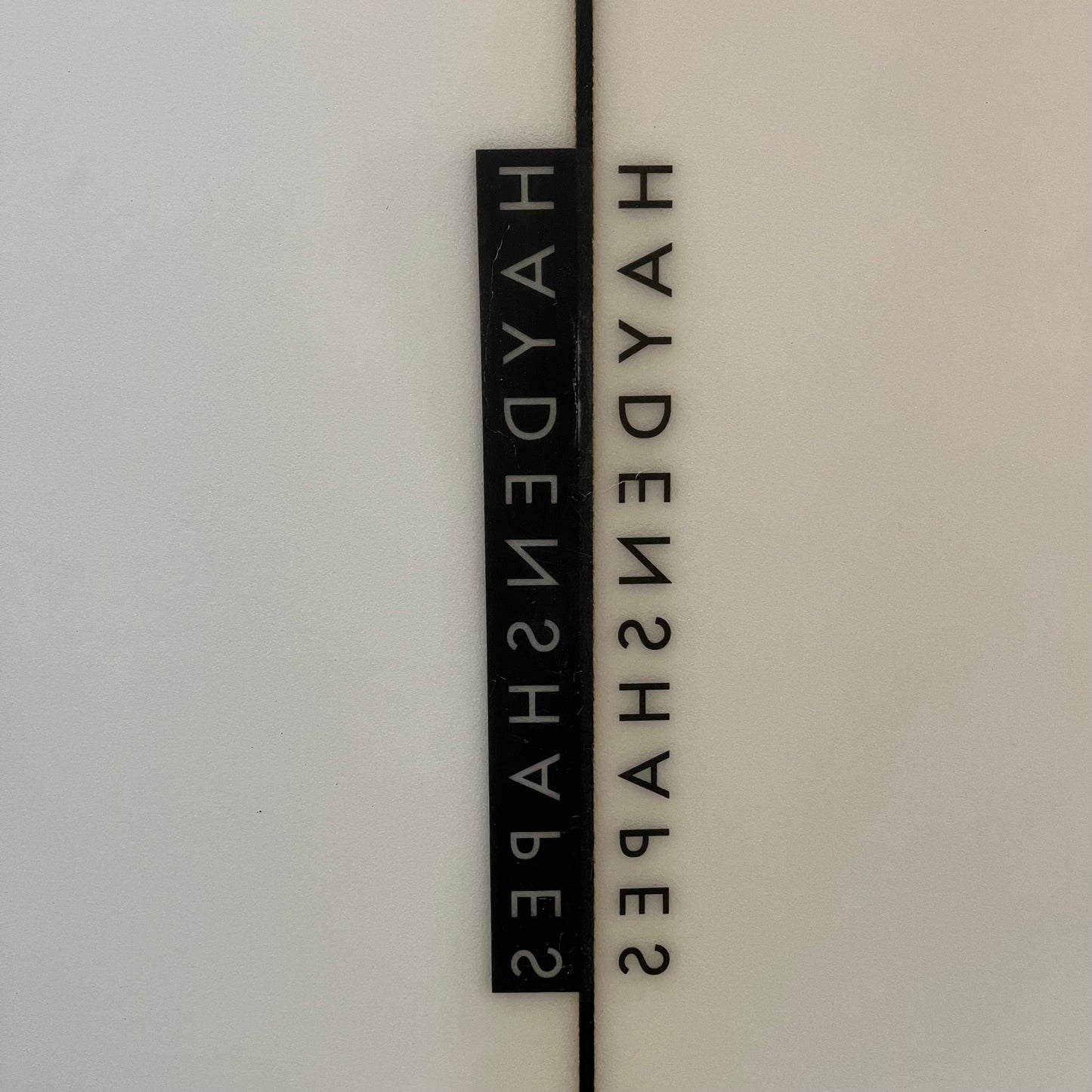 Hayden Shapes Cohort 6'0" secondhand surfboard brand logo close-up