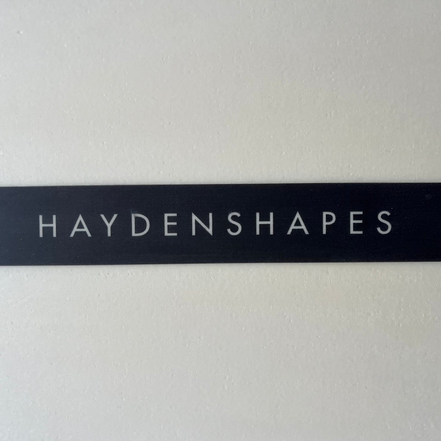Hayden Shapes Holy Grail 5'9" secondhand surfboard logo name close-up