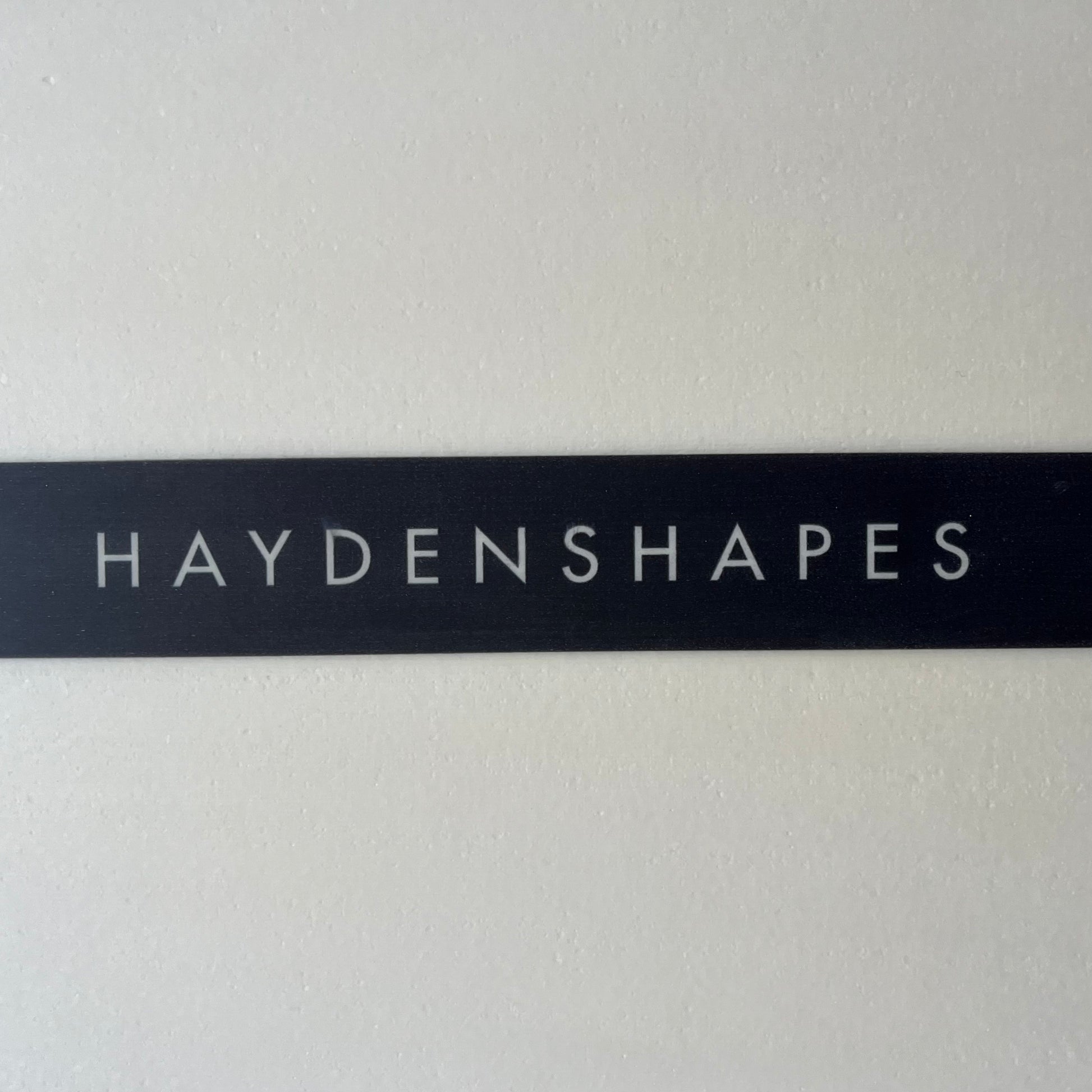 Hayden Shapes Holy Grail 5'9" secondhand surfboard logo name close-up