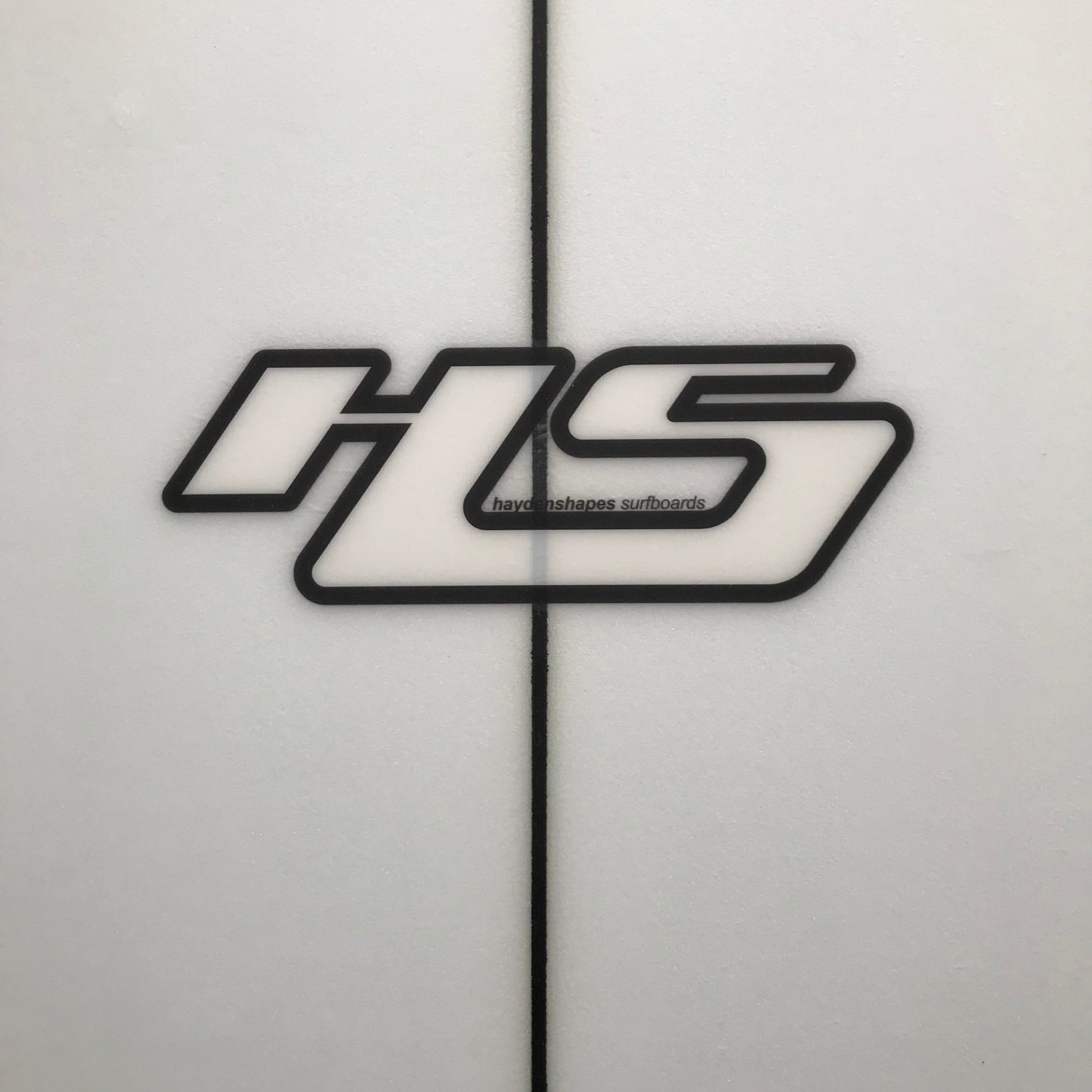 Hayden Shapes Loot 5'10" secondhand surfboard brand logo close-up