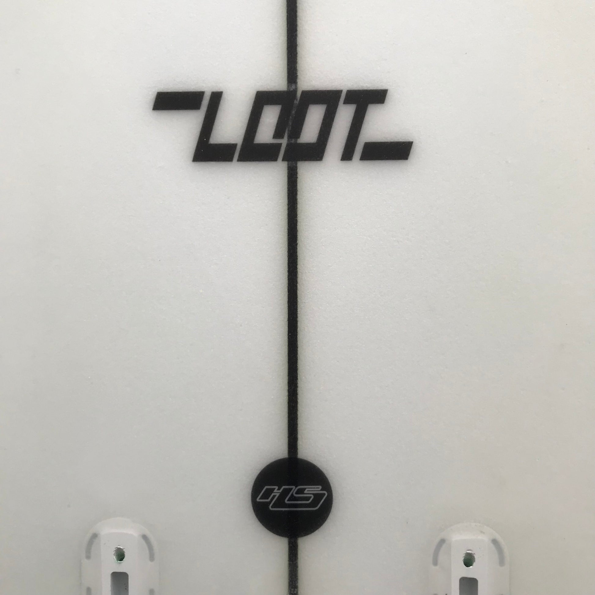 Hayden Shapes Loot 5'10" secondhand surfboard model logo close-up