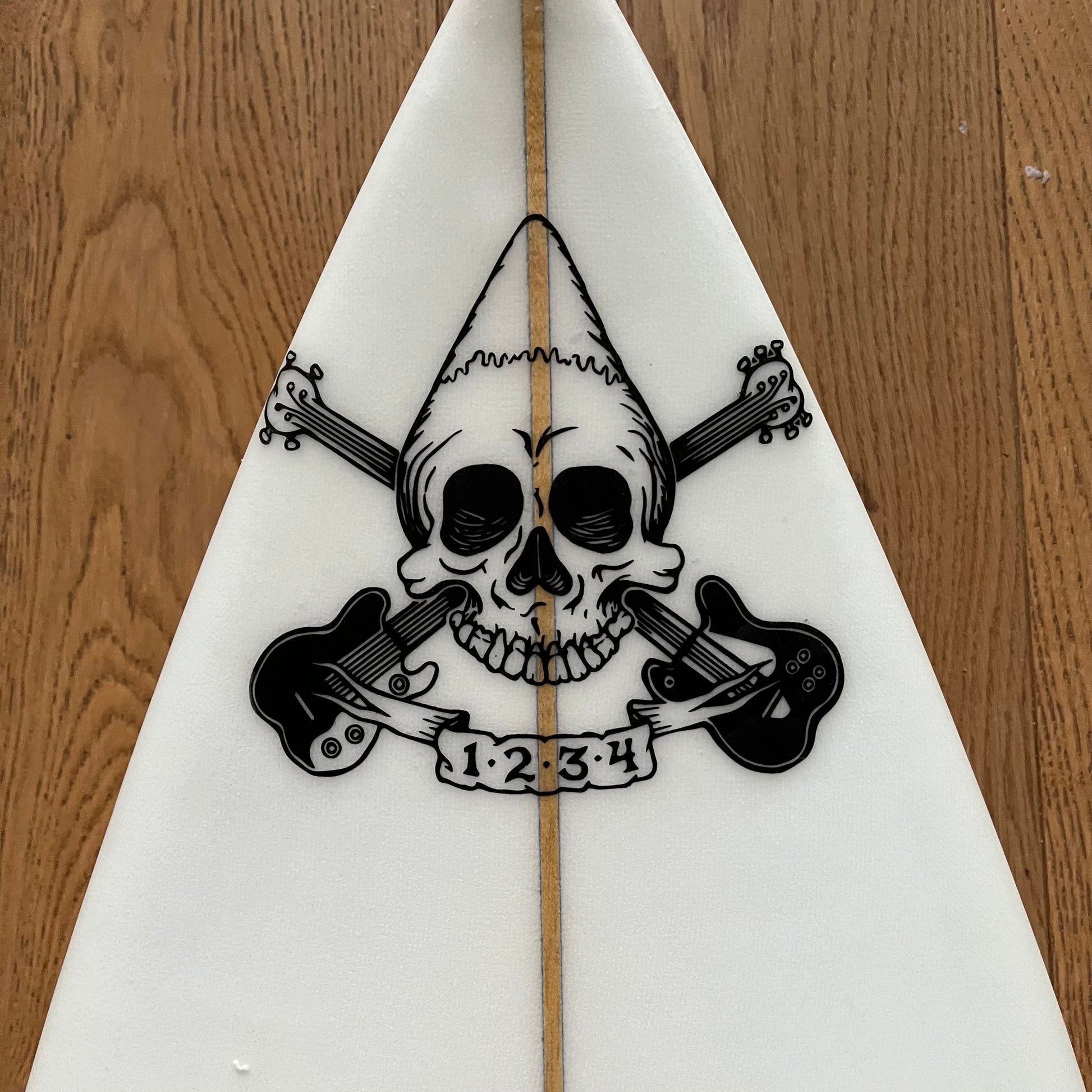 Jolly Roger 1234 6'2" secondhand surfboard brand logo close-up