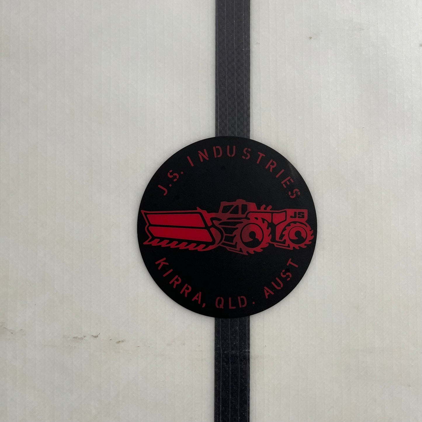 JS Red Baron 5'6" secondhand surfboard brand logo close-up