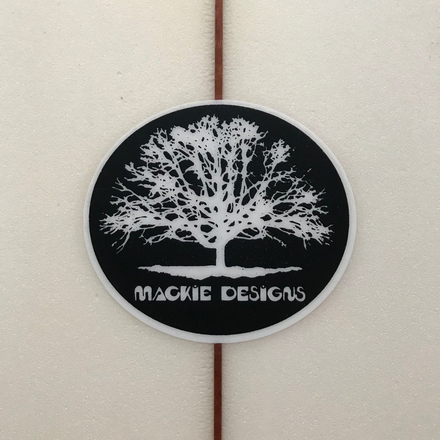 Mackie Designs Side Cut 6'8" secondhand surfboard brand logo close-up