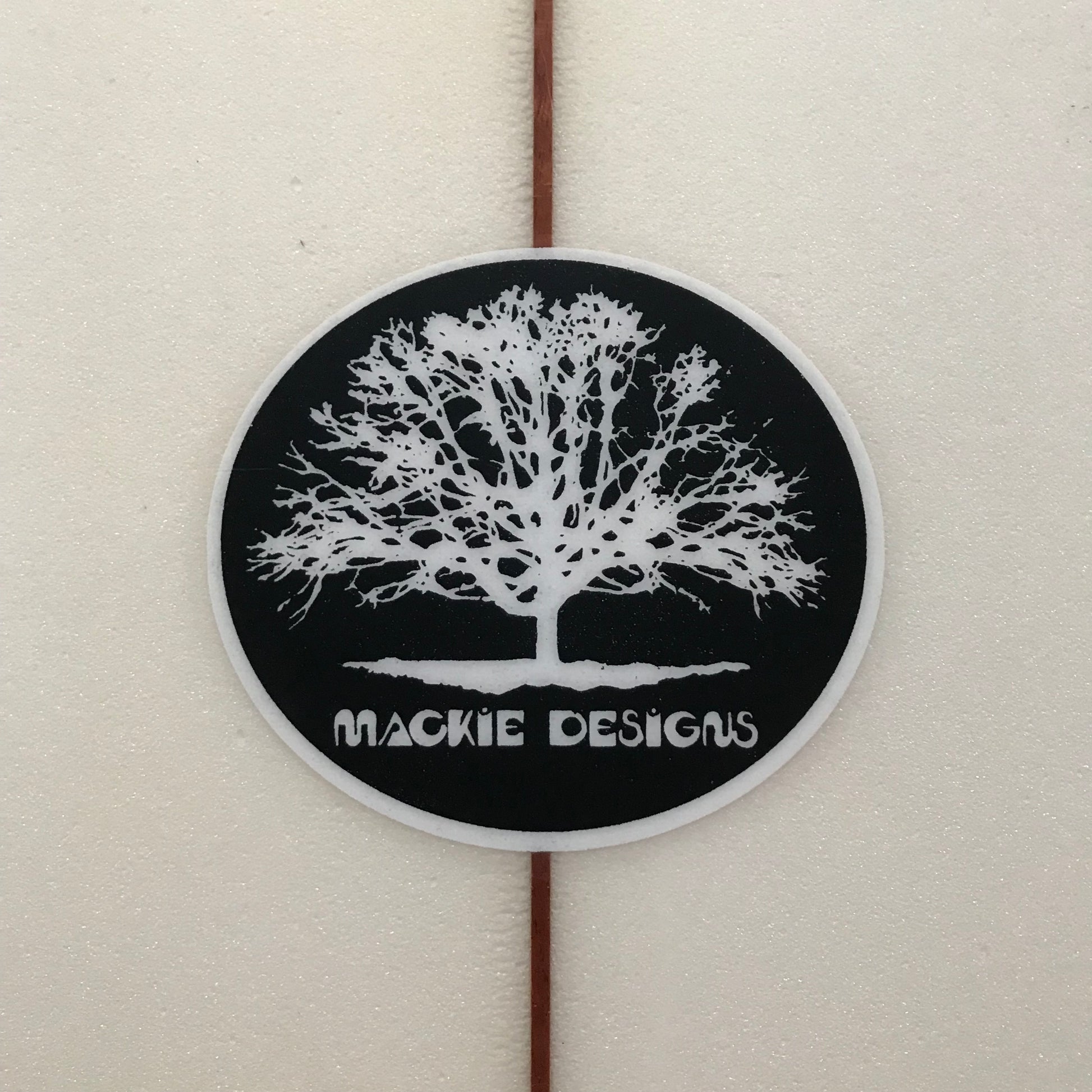 Mackie Designs Side Cut 6'8" secondhand surfboard brand logo close-up