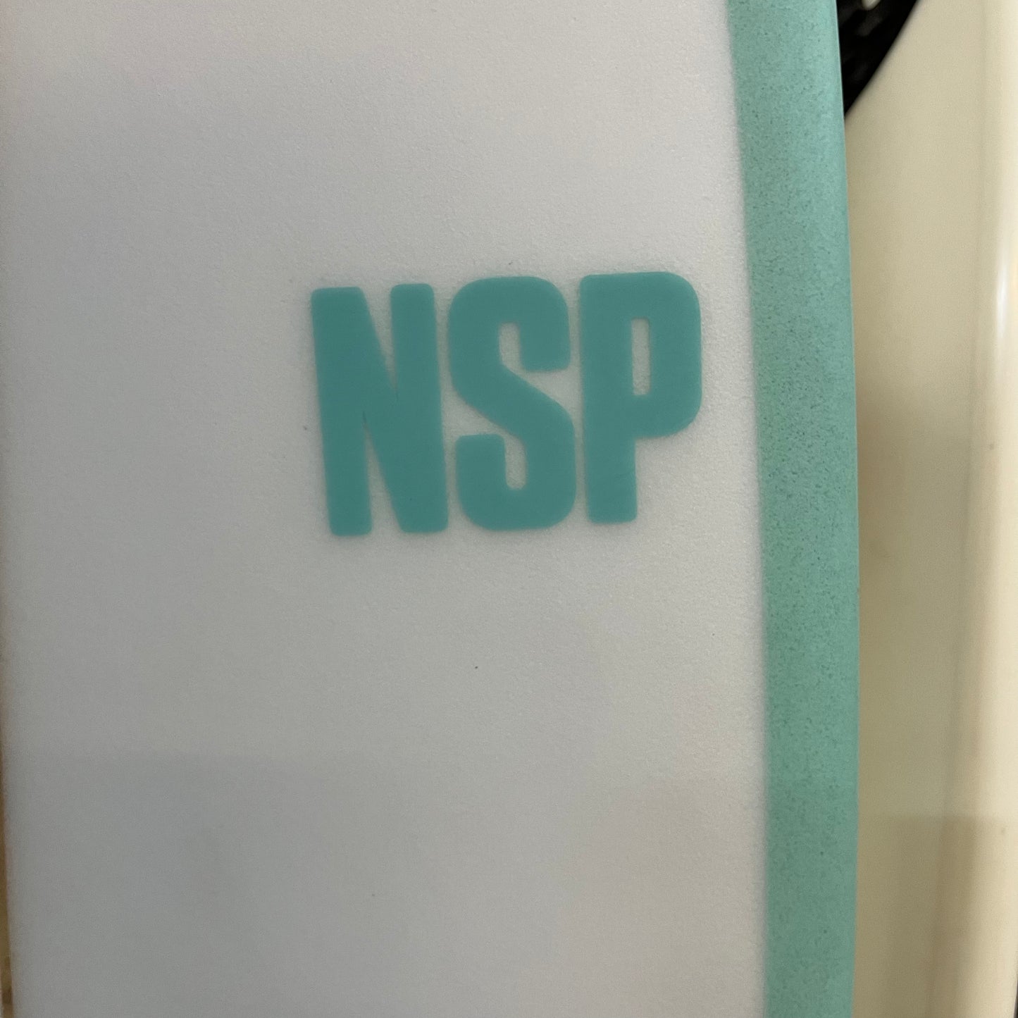 NSP Fish King 5'6" secondhand surfboard brand logo close-up