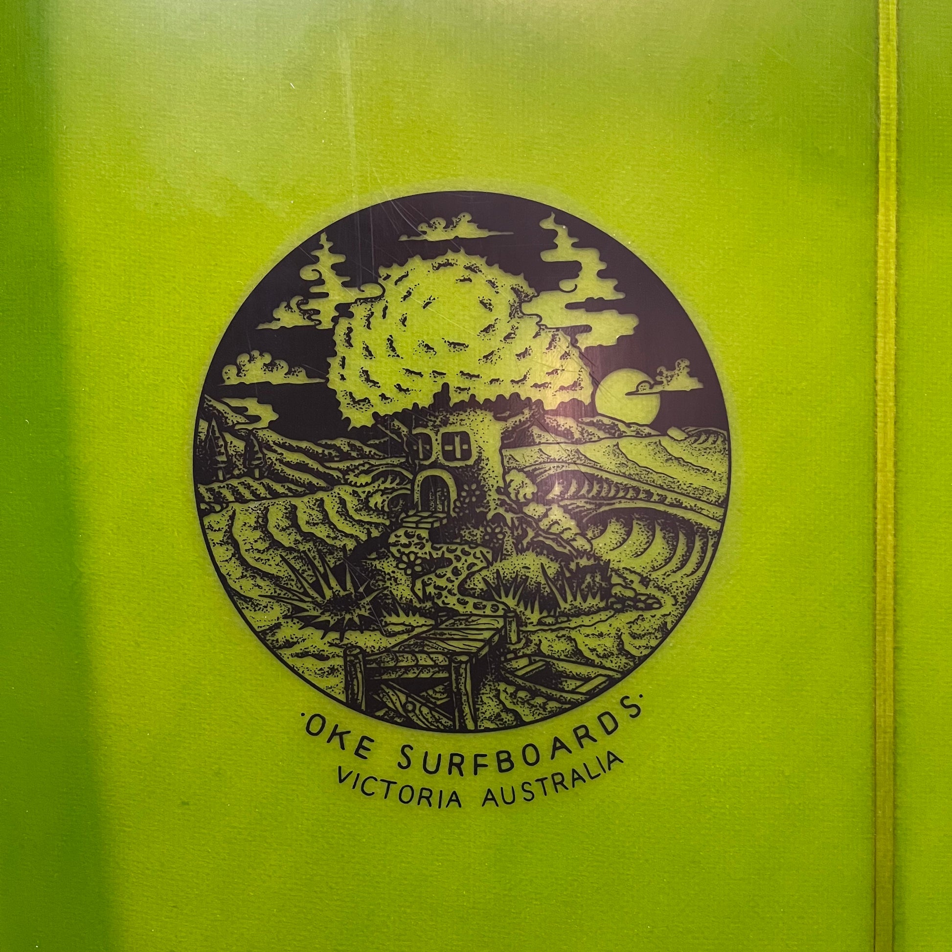 Oke Surfboards longboard 9'6" secondhand surfboard brand logo close-up