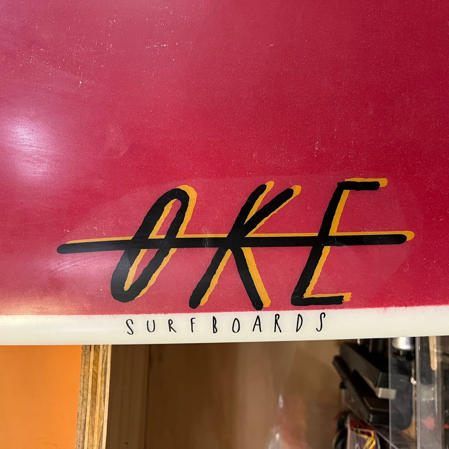 Oke Surfboards twin pin 7'0" secondhand surfboard brand logo name close-up