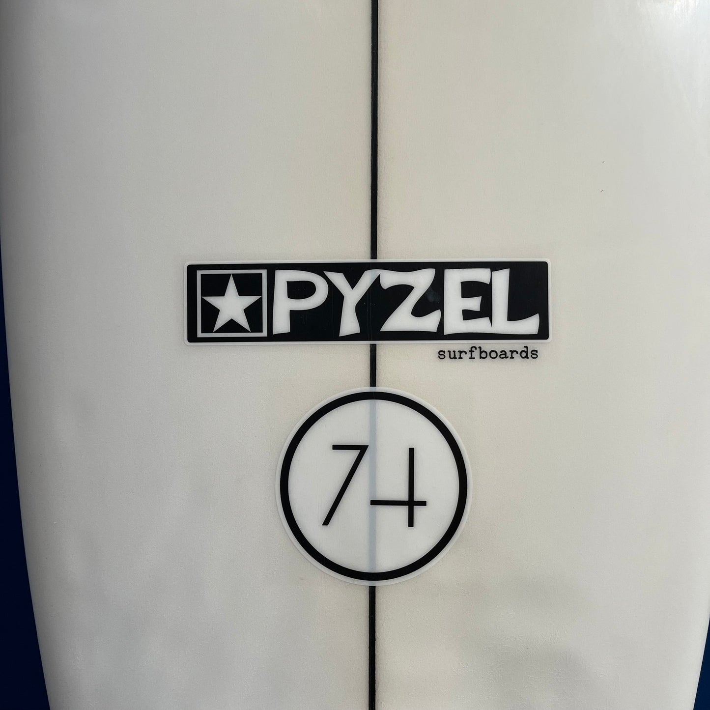 Pyzel 74 6'1" secondhand surfboard brand logo close-up