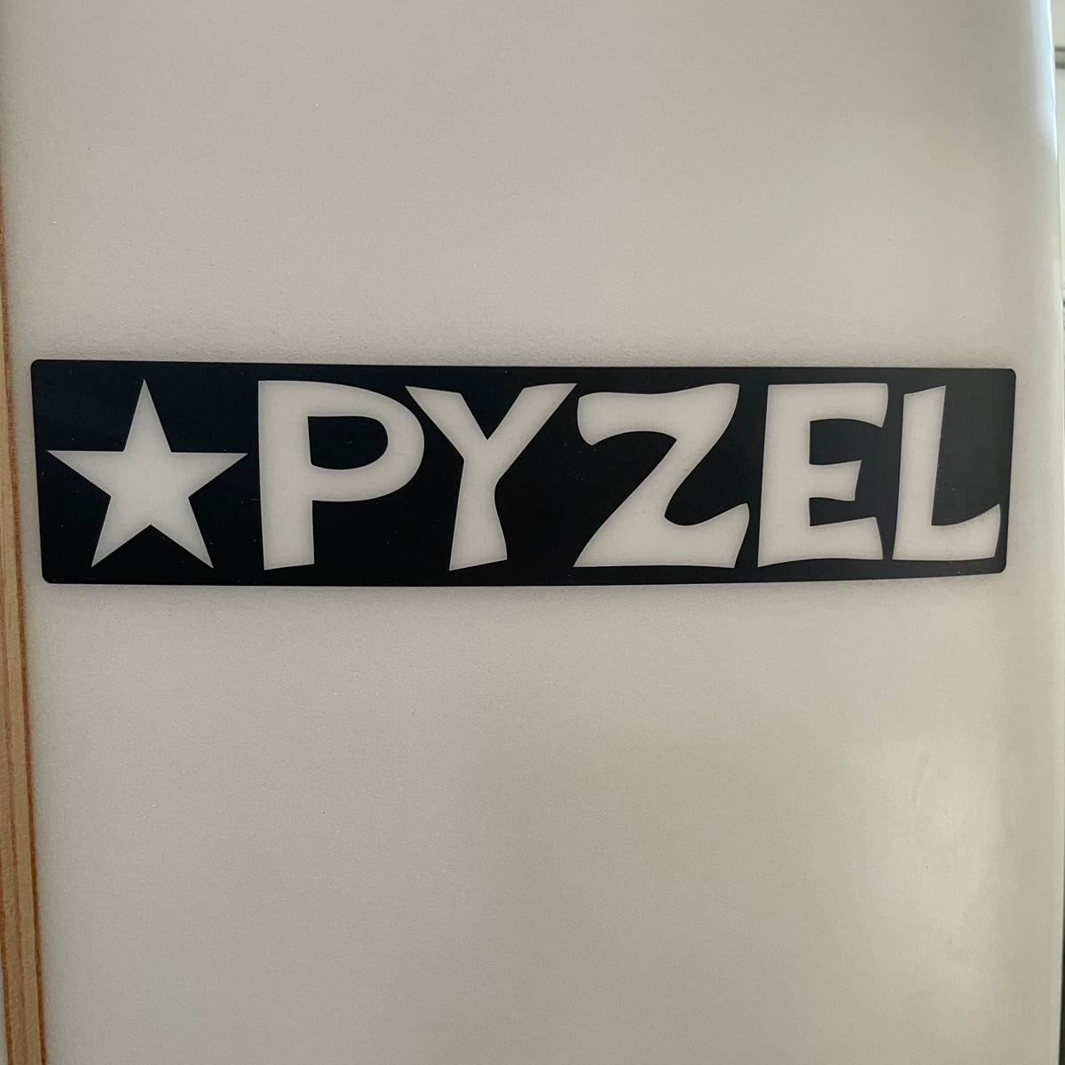 Pyzel Padillac 7'8" secondhand surfboards brand logo close-up