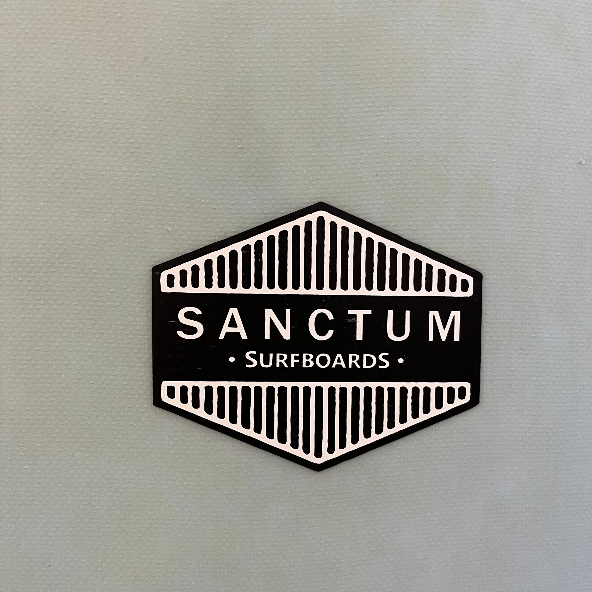 Sanctum Surfboards Magic Carpet 8'2" secondhand surfboard brand logo close-up