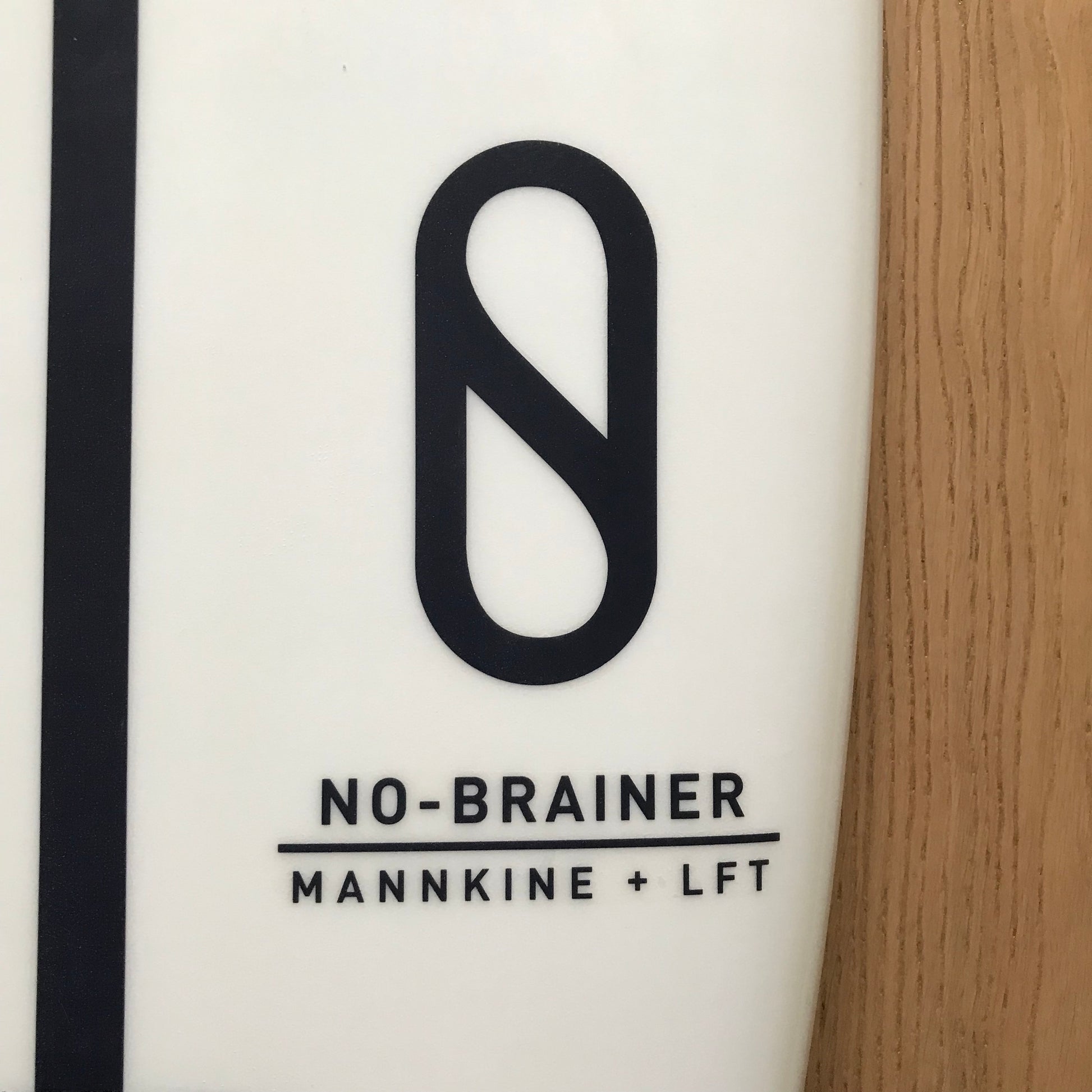 Slater Designs No Brainer 5'4" secondhand surfboard model logo close-up