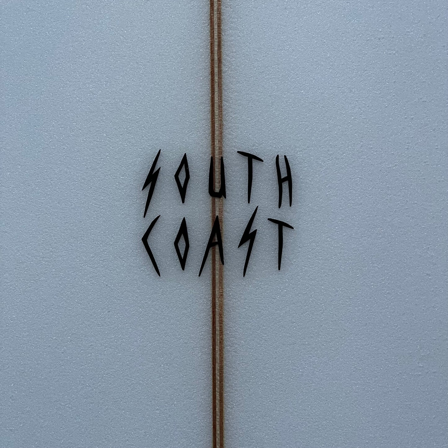 South Coast Twinzer 7'6" secondhand surfboard brand logo close-up