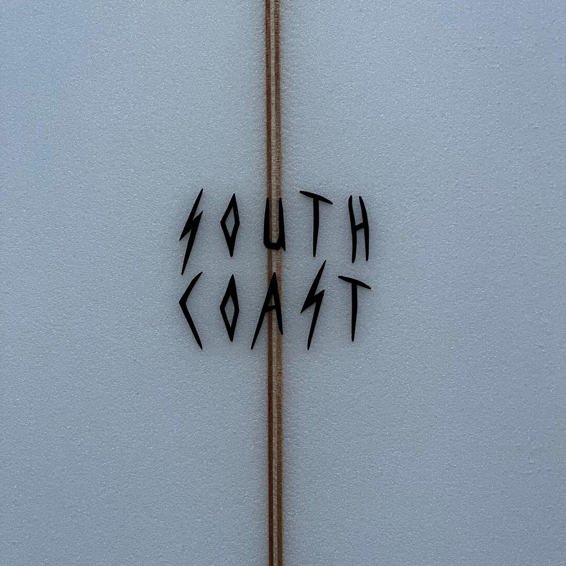 South Coast Twinzer 7'6" secondhand surfboard brand logo close-up