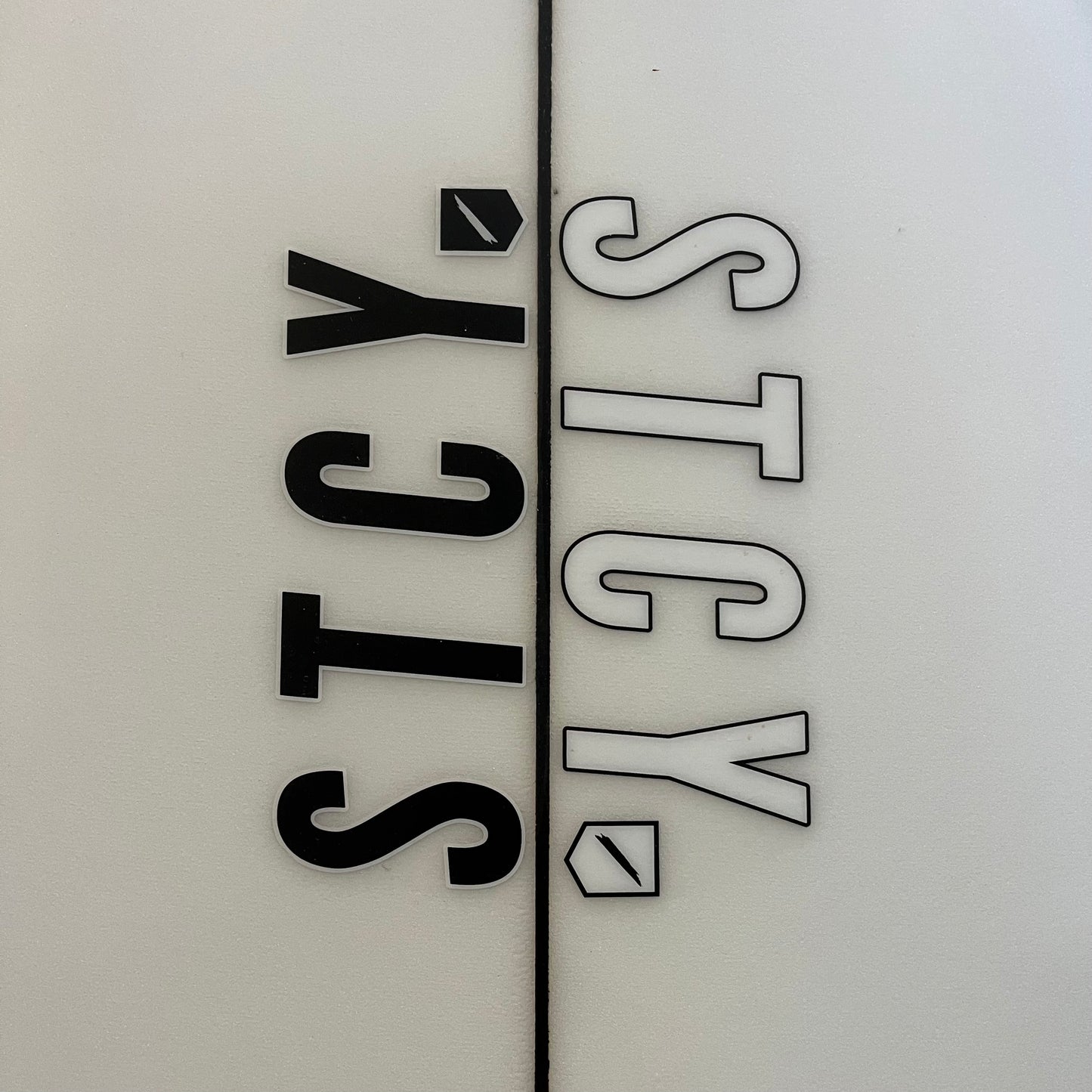 Stacey Binggal Bulaa 6'4" secondhand surfboard brand logo close-up