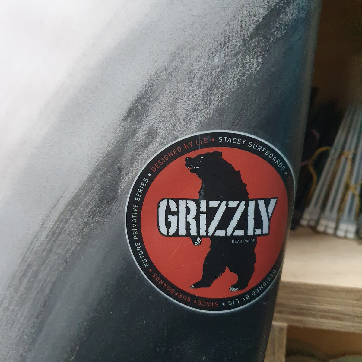 Stacey Grizzly 6'1" secondhand surfboards model logo close-up