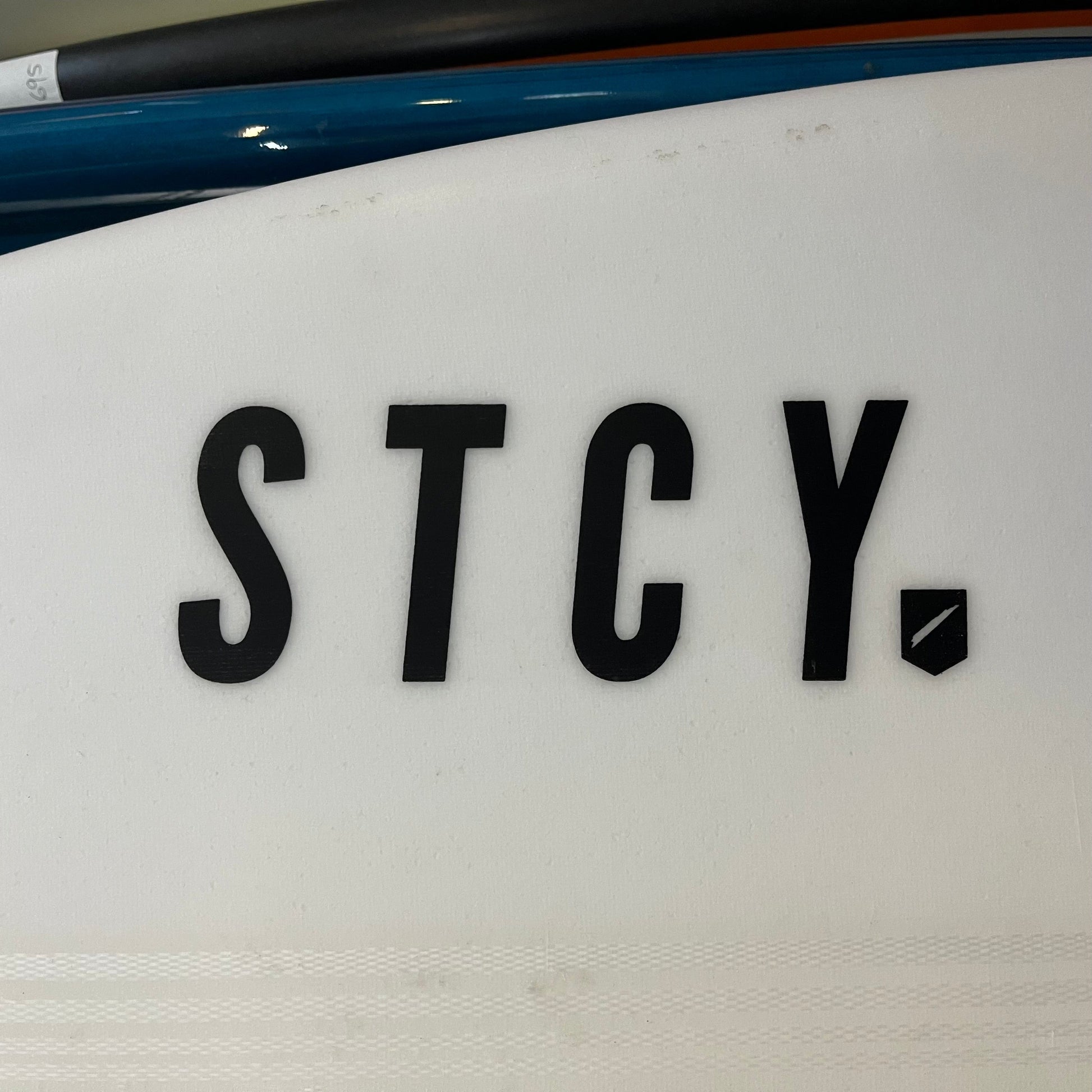 Stacey Roach 2 5'8" secondhand surfboard brand logo close-up