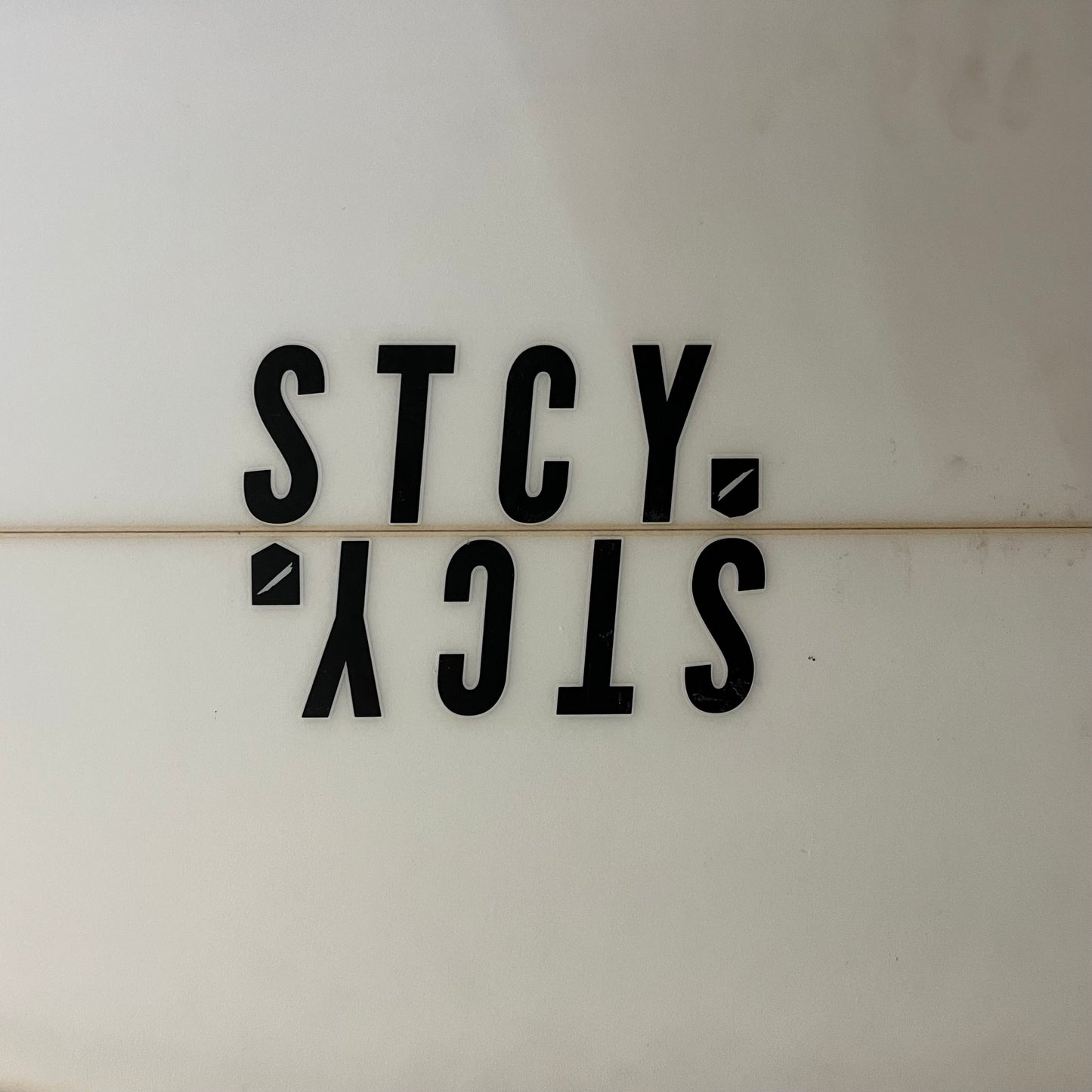 Stacey Times Two 5'10" secondhand surfboard brand logo close-up