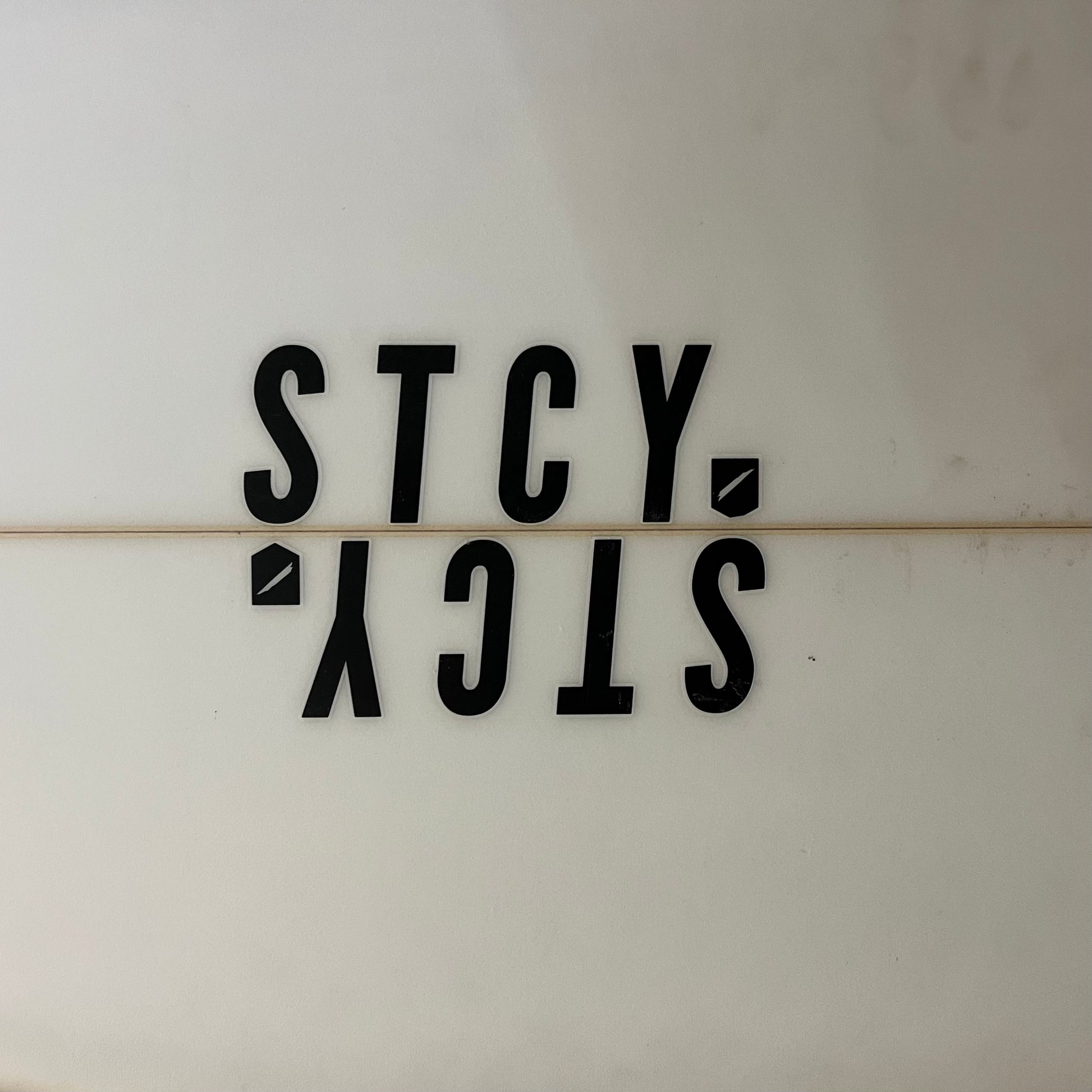 Stacey Times Two 5'10" secondhand surfboard brand logo close-up